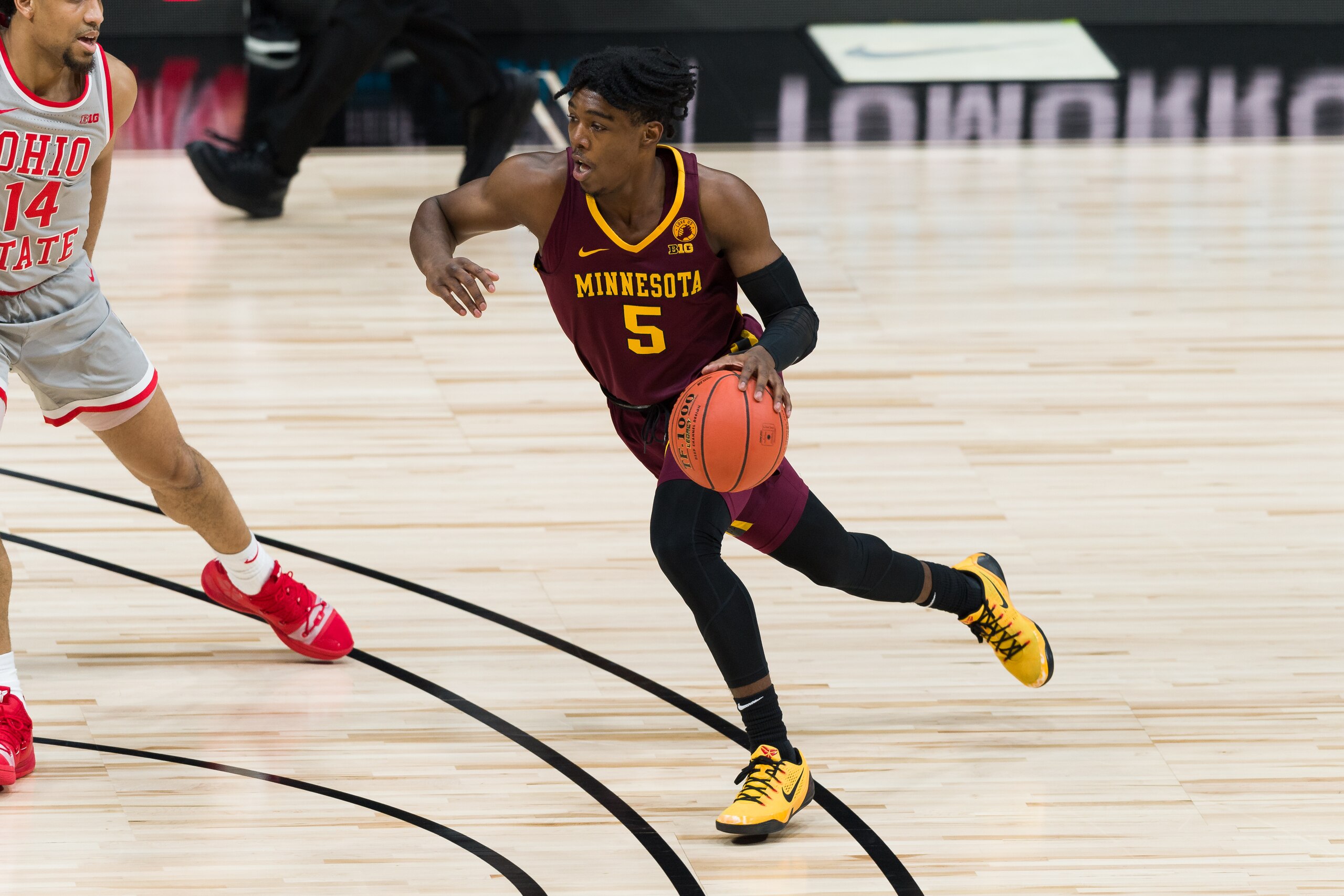 INDIANAPOLIS, IN - MARCH 11: Minnesota Golden Gophers guard Marcus Carr (5) drives into the lane during the men's Big Ten tournament college basketball game between the Minnesota Golden Gophers and Ohio State Buckeyes on March 11, 2021, at Lucas Oil Stadium in Indianapolis, IN. (Photo by Zach Bolinger/Icon Sportswire via Getty Images)