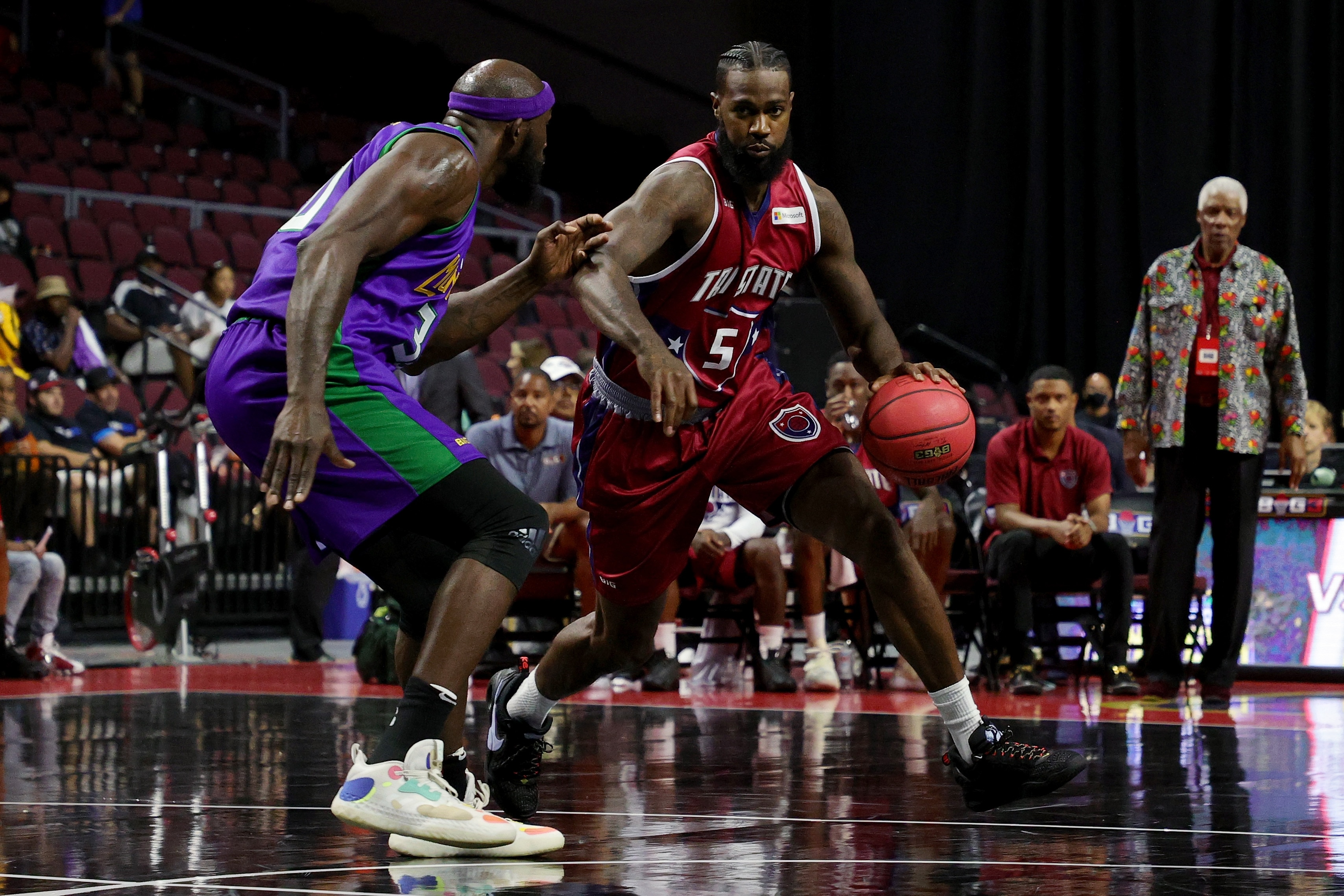 LAS VEGAS, NEVADA - JULY 10: Earl Clark #5 of the Tri State dribbles the ball while being guarded by Reggie Evans #30 of the 3 Headed Monsters during BIG3 - Week One at the Orleans Arena on July 10, 2021 in Las Vegas, Nevada. (Photo by Stacy Revere/Getty Images for BIG3)