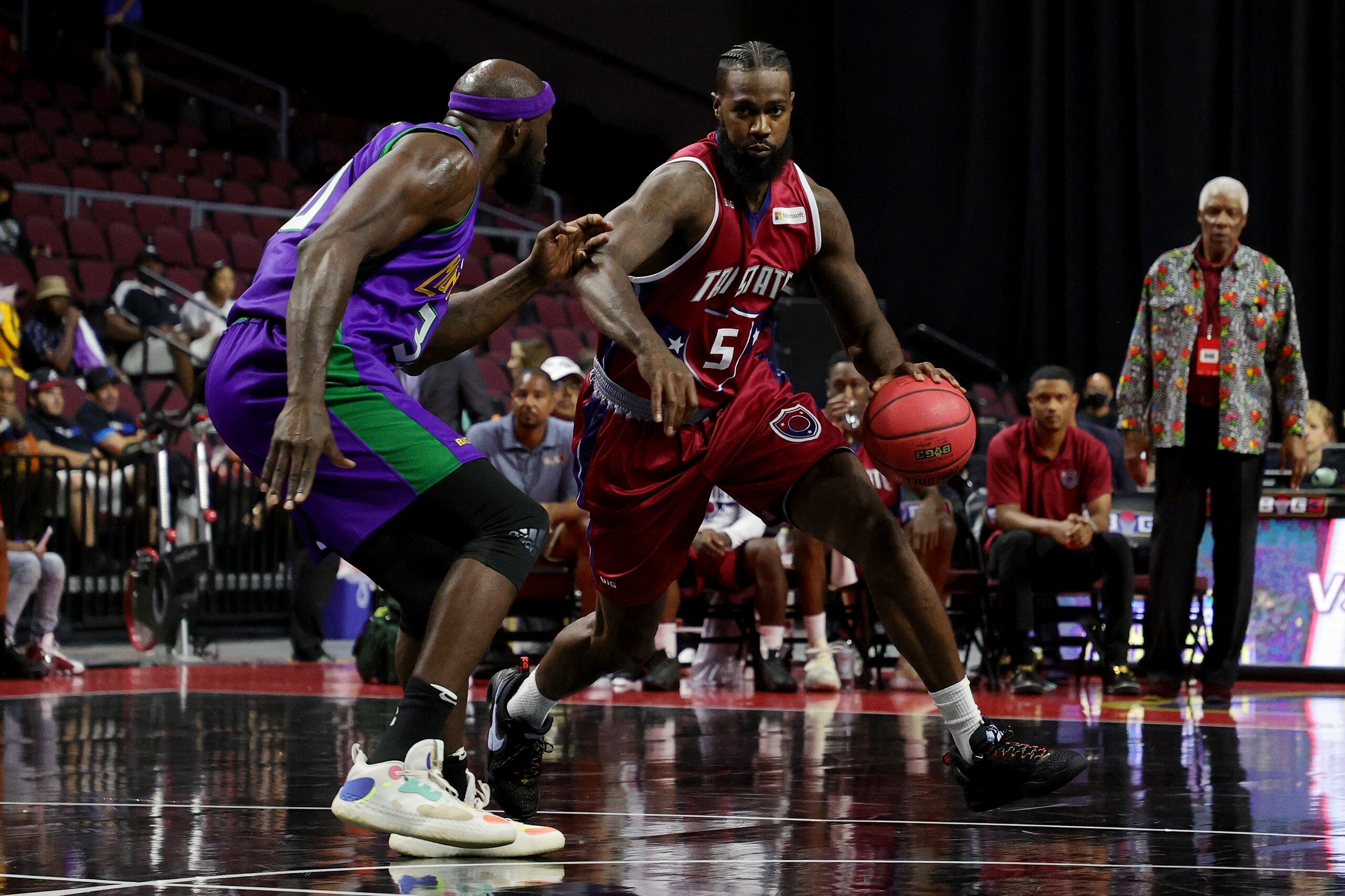 LAS VEGAS, NEVADA - JULY 10: Earl Clark #5 of the Tri State dribbles the ball while being guarded by Reggie Evans #30 of the 3 Headed Monsters during BIG3 - Week One at the Orleans Arena on July 10, 2021 in Las Vegas, Nevada. (Photo by Stacy Revere/Getty Images for BIG3)