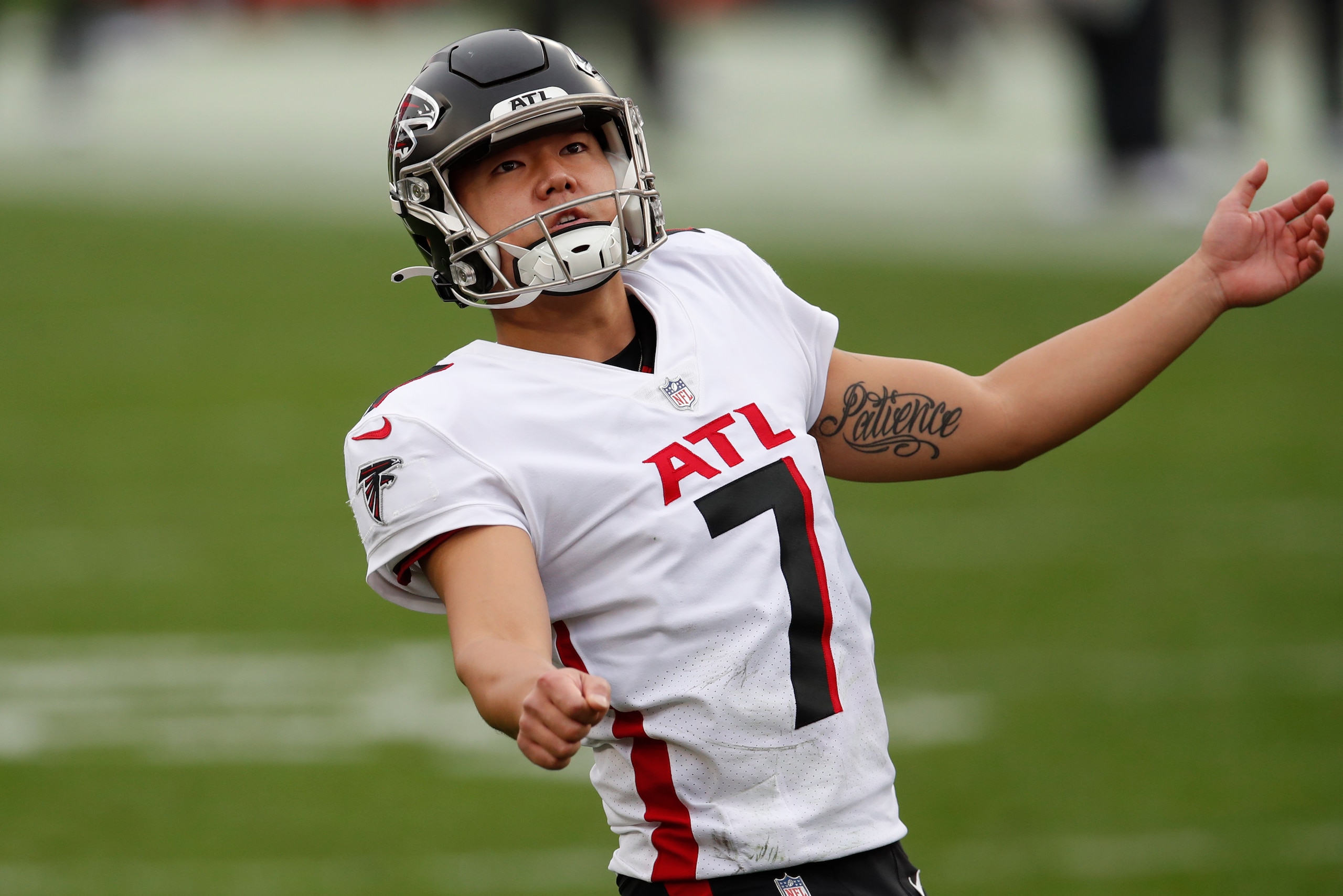 Atlanta Falcons kicker Younghoe Koo (7) watches his kick against the Tampa Bay Buccaneers during an NFL football game Sunday, Jan. 3, 2021, in Tampa, Fla. The Buccaneers won the game 44-27. (Jeff Haynes/AP Images for Panini)