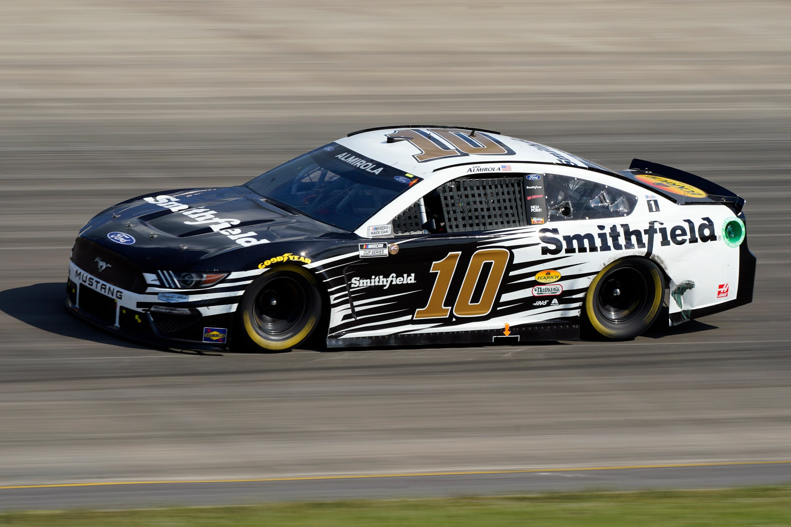 Aric Almirola (10) competes during a NASCAR Cup Series auto race Sunday, June 20, 2021, in Lebanon, Tenn. (AP Photo/Mark Humphrey)