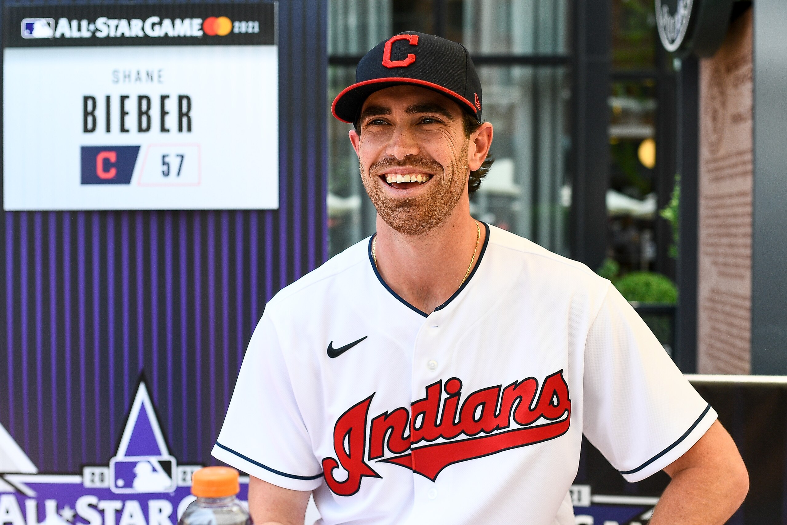 DENVER, CO - JULY 12: Shane Bieber #57 of the Cleveland Indians talks to reporters during the Gatorade All-Star Workout Day outside of Coors Field on July 12, 2021 in Denver, Colorado. (Photo by Dustin Bradford/Getty Images)