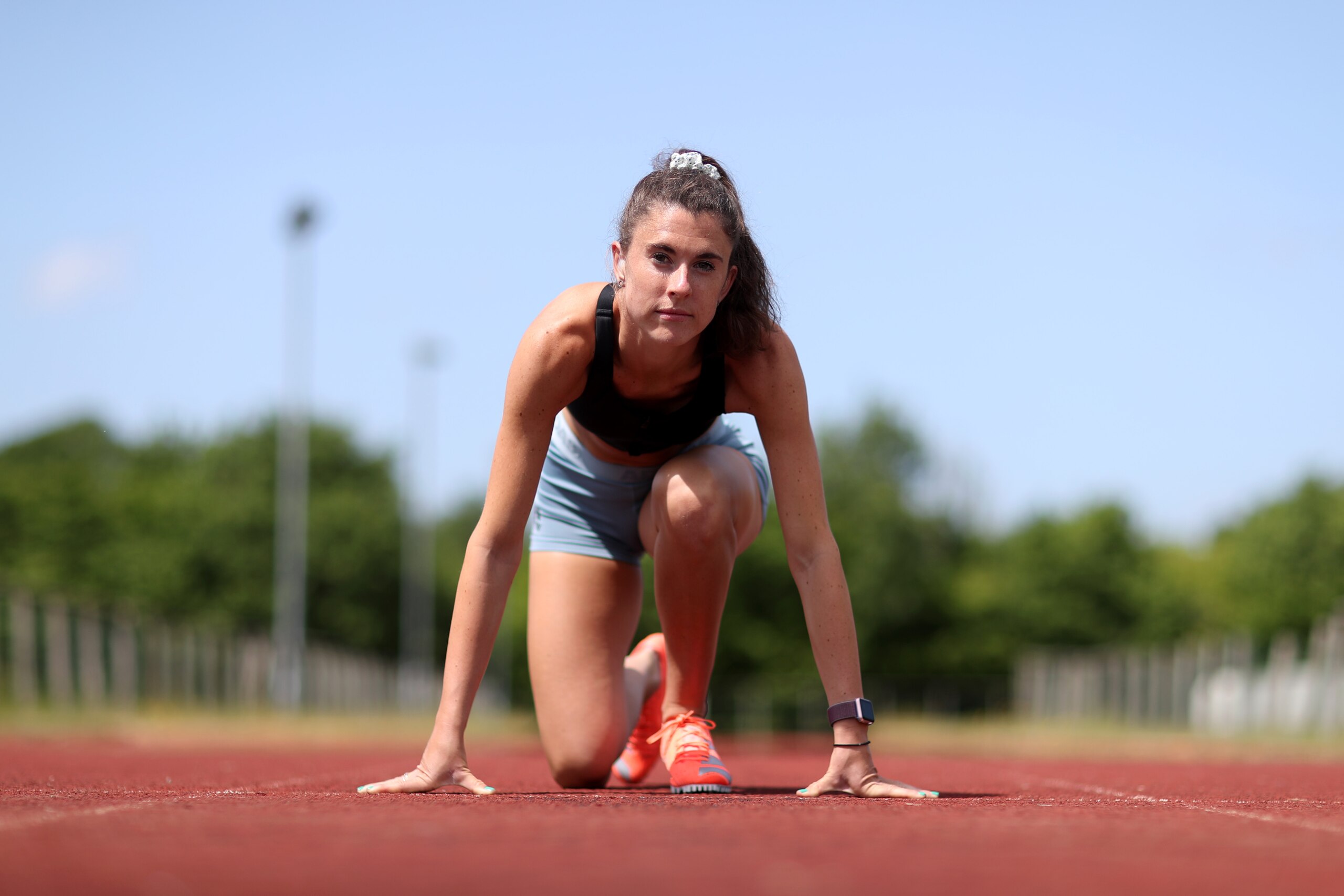 LIPHOOK, ENGLAND - MAY 22: Paralympian Olivia Breen of Great Britain continues to train in isolation at a local running track near to her Family home in Liphook on May 22, 2020 in Liphook, England. The coronavirus and the disease it causes, COVID-19, are having a fundamental impact on society, government, sports and the economy in United Kingdom. As all sports events in United Kingdom have been cancelled athletes struggle to continue their training as usual. (Photo by Naomi Baker/Getty Images)