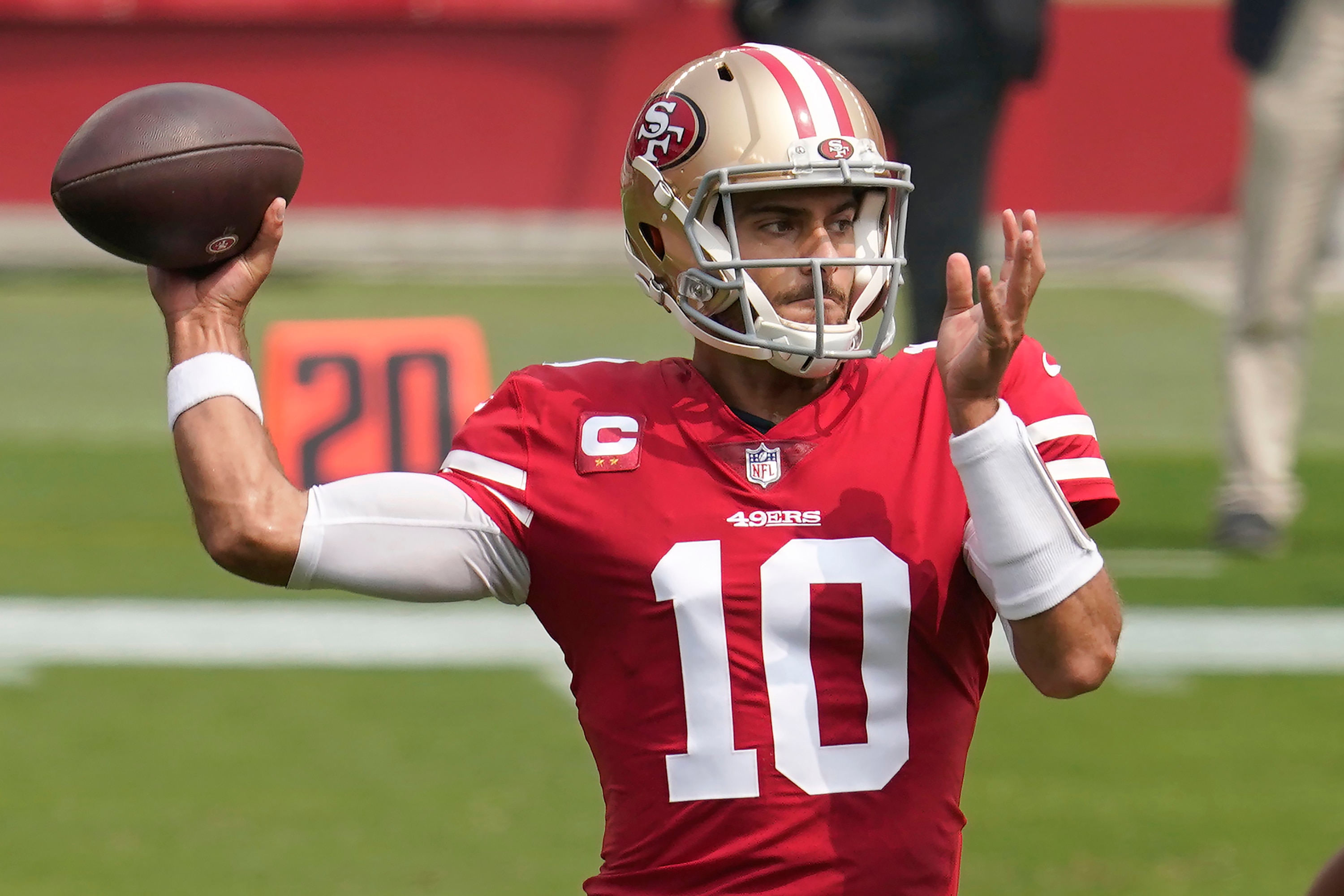 FILE - San Francisco 49ers quarterback Jimmy Garoppolo (10) passes against the Arizona Cardinals during the first half of an NFL football game in Santa Clara, Calif., in this Sunday, Sept. 13, 2020, file photo. The Matthew Stafford-Jared Goff trade not only has whet fans' appetites for big deals, it's caused a social media frenzy about which quarterbacks are headed elsewhere. (AP Photo/Tony Avelar, File)