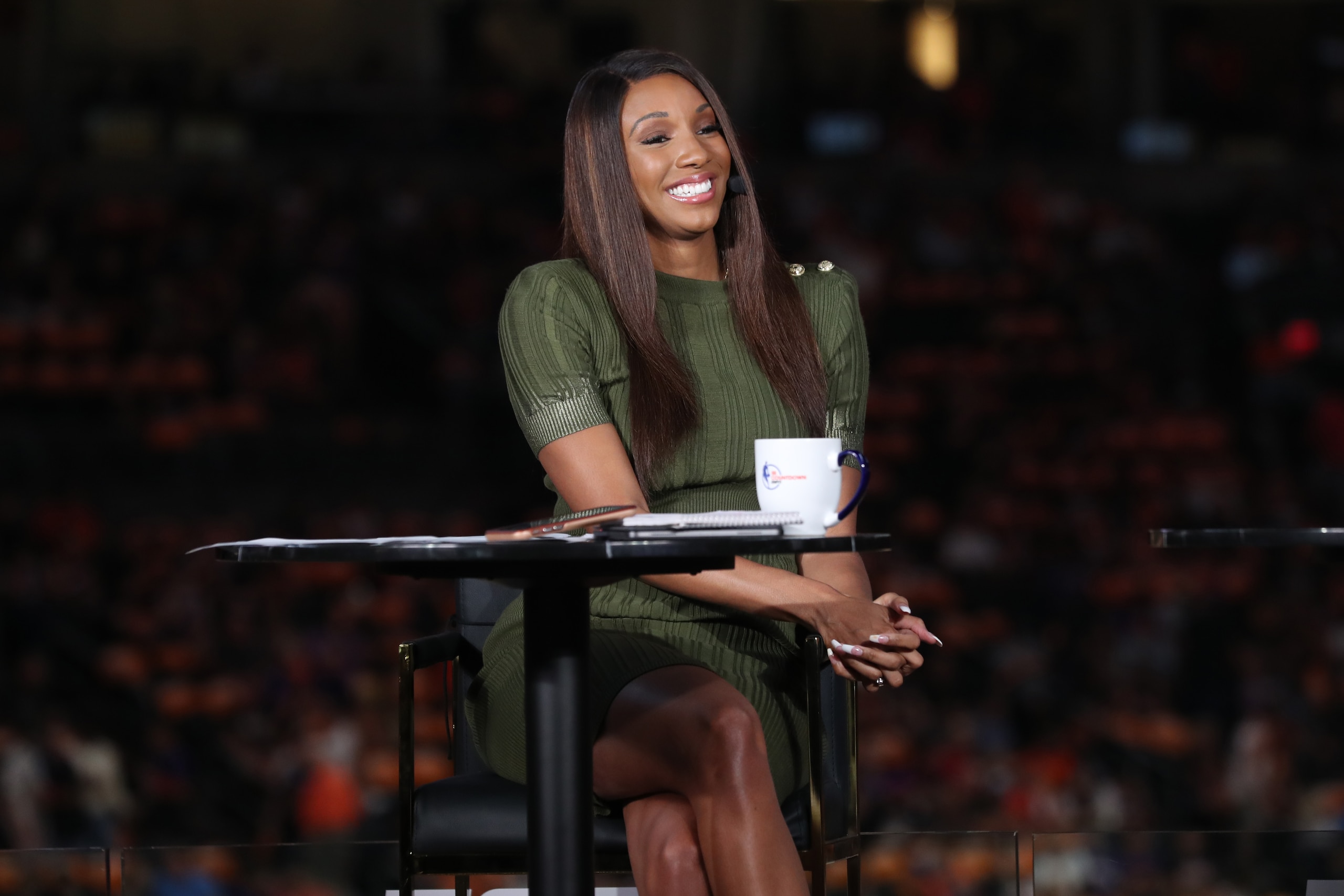 PHOENIX, AZ - July 17: ESPN Analyst Maria Taylor smiles before the Milwaukee Bucks game against the Phoenix Suns during Game Five of the 2021 NBA Finals on July 17, 2021 at Footprint Center in Phoenix, Arizona. NOTE TO USER: User expressly acknowledges and agrees that, by downloading and or using this photograph, user is consenting to the terms and conditions of the Getty Images License Agreement. Mandatory Copyright Notice: Copyright 2021 NBAE (Photo by Joe Murphy/NBAE via Getty Images)