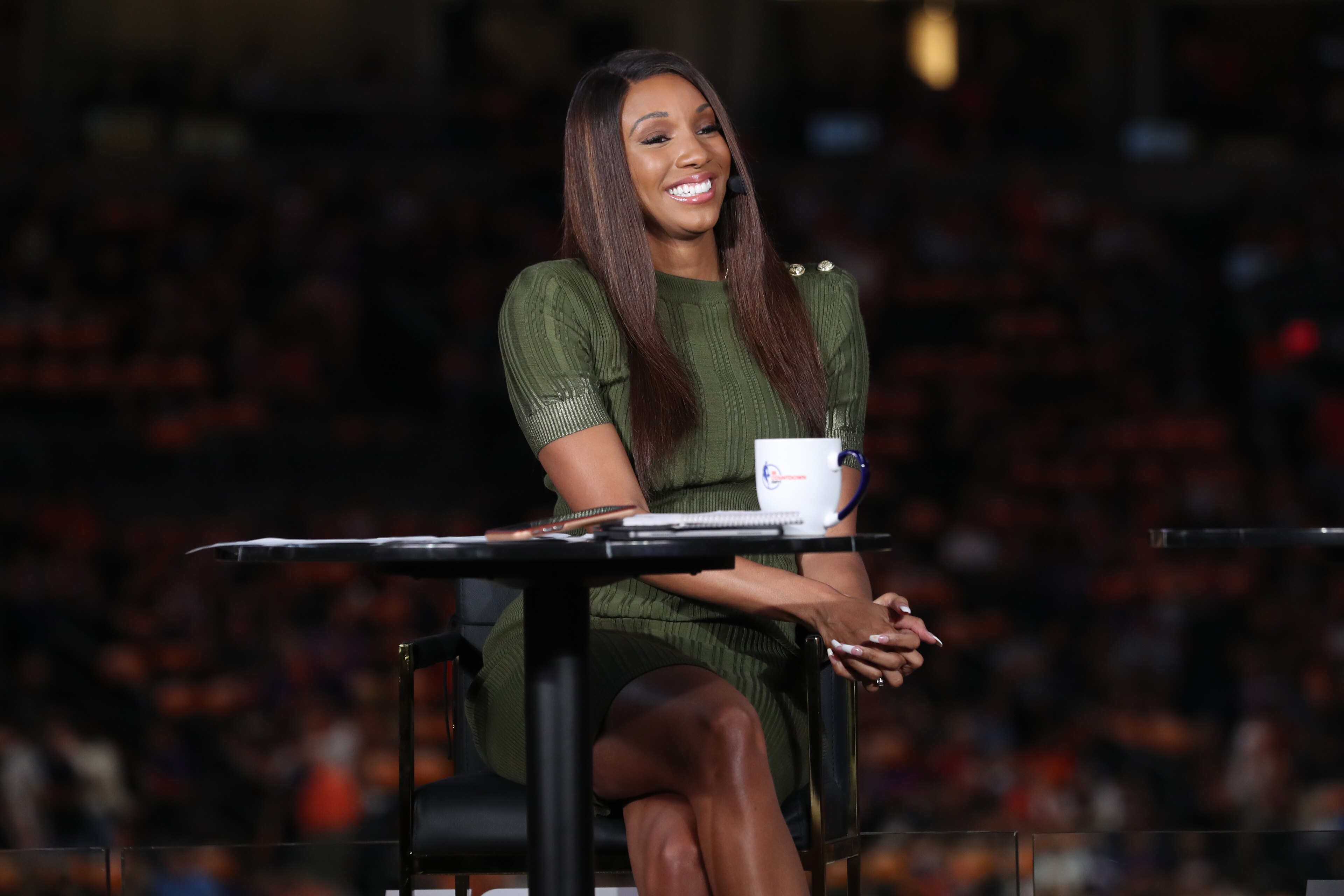 PHOENIX, AZ - July 17: ESPN Analyst Maria Taylor smiles before the Milwaukee Bucks game against the Phoenix Suns during Game Five of the 2021 NBA Finals on July 17, 2021 at Footprint Center in Phoenix, Arizona. NOTE TO USER: User expressly acknowledges and agrees that, by downloading and or using this photograph, user is consenting to the terms and conditions of the Getty Images License Agreement. Mandatory Copyright Notice: Copyright 2021 NBAE (Photo by Joe Murphy/NBAE via Getty Images)