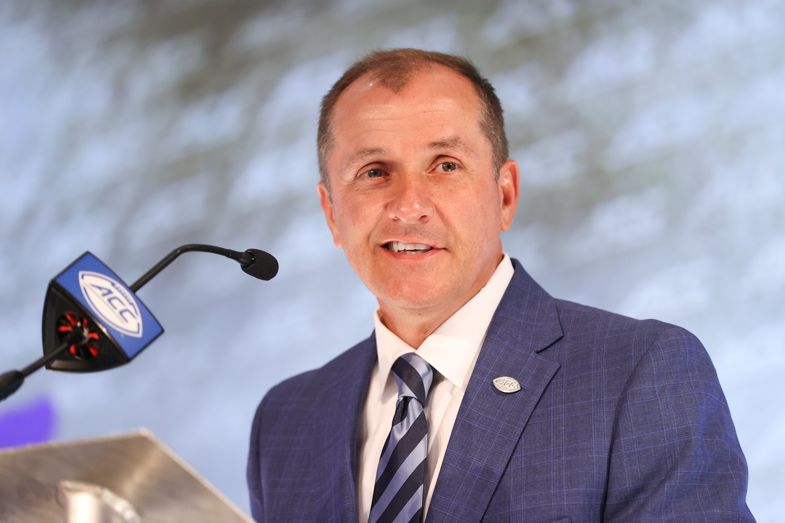 Atlantic Coast Conference commissioner Jim Phillips speaks during the NCAA college football ACC media days in Charlotte, N.C., Wednesday, July 21, 2021. (AP Photo/Nell Redmond) Atlantic Coast Conference commissioner Jim Phillips speaks during the NCAA college football ACC media days in Charlotte, N.C., Wednesday, July 21, 2021. (AP Photo/Nell Redmond)