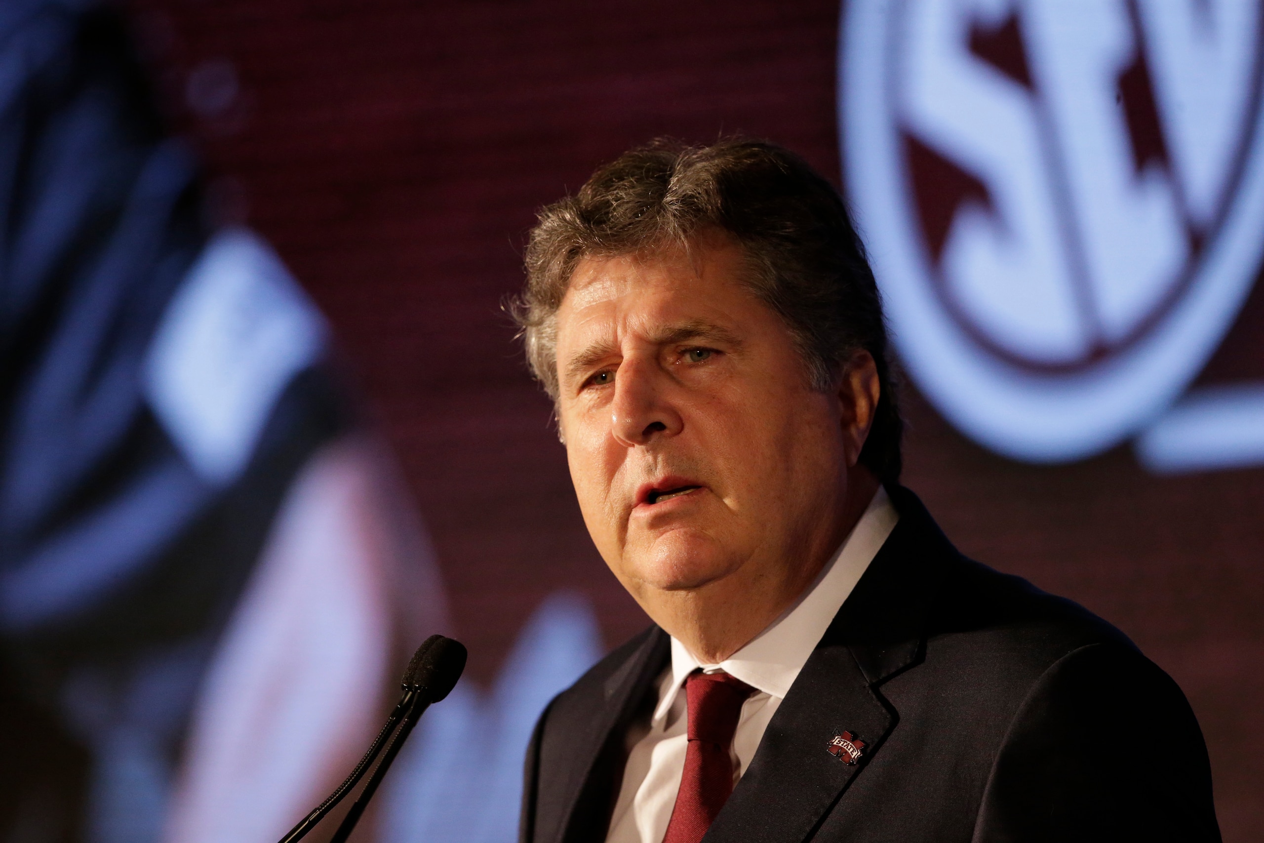 Mississippi State head coach Mike Leach speaks to reporters during the NCAA college football Southeastern Conference Media Days Wednesday, July 21, 2021, in Hoover, Ala. (AP Photo/Butch Dill)