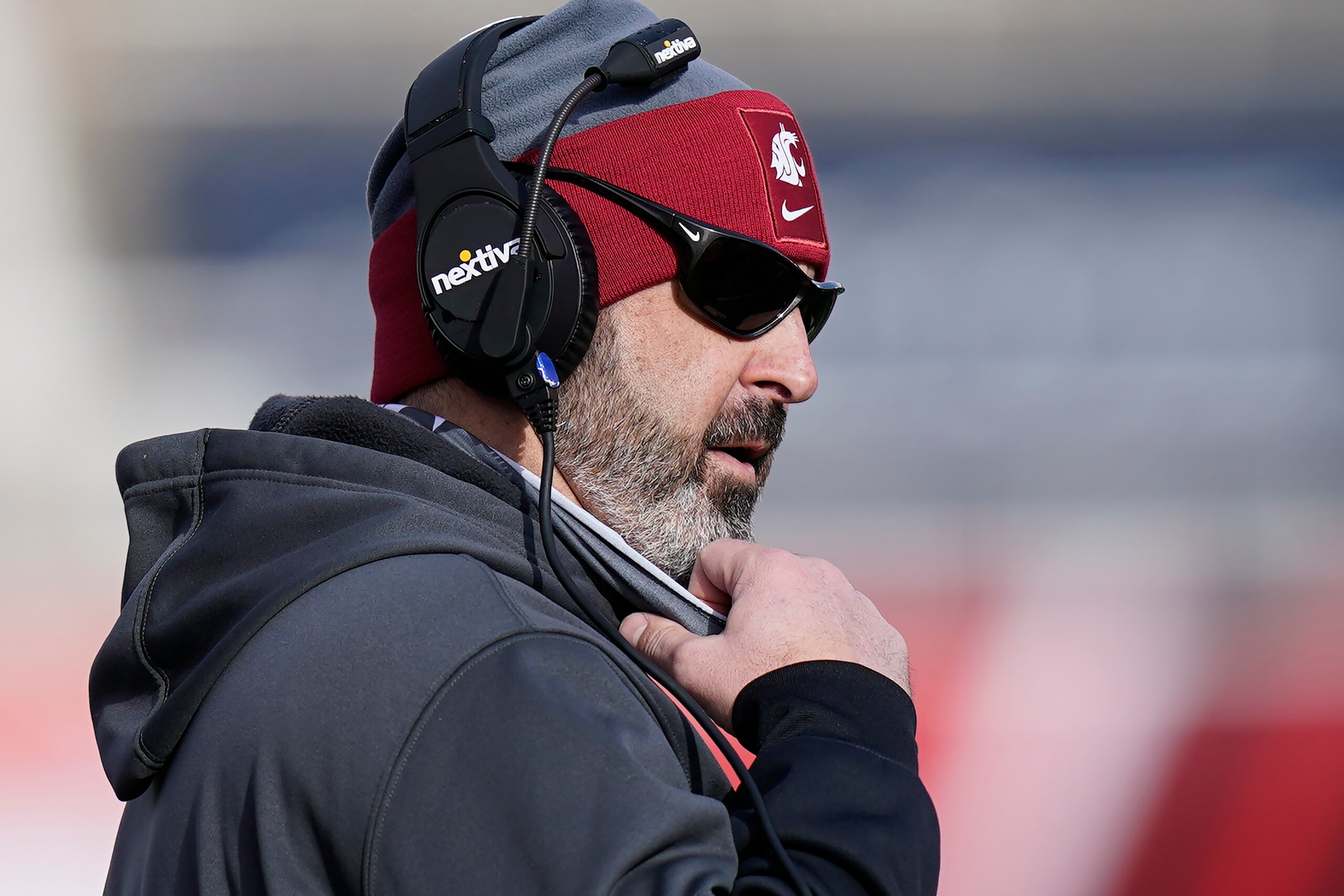 Washington State head coach Nick Rolovich looks on during the first half of an NCAA college football game against Utah, Saturday, Dec. 19, 2020, in Salt Lake City. (AP Photo/Rick Bowmer)