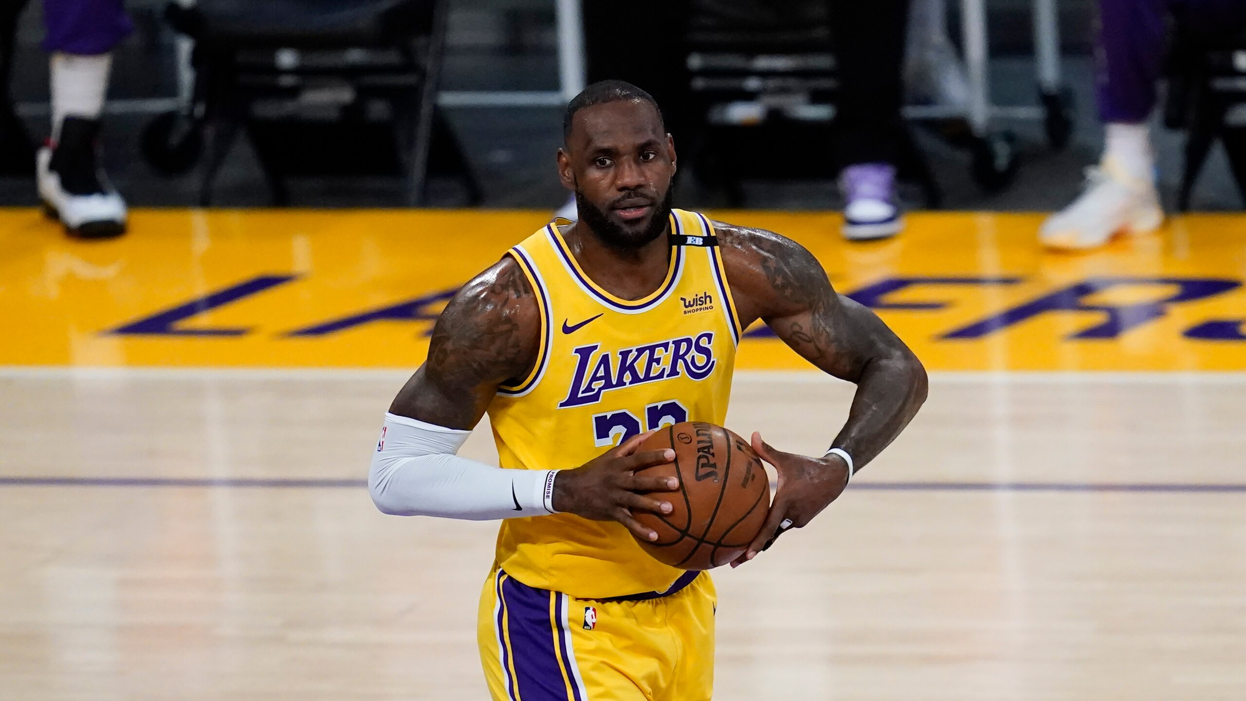 Los Angeles Lakers forward LeBron James (23) controls the ball during Game 6 of an NBA basketball first-round playoff series against the Phoenix Suns Thursday, Jun 3, 2021, in Los Angeles. (AP Photo/Ashley Landis)