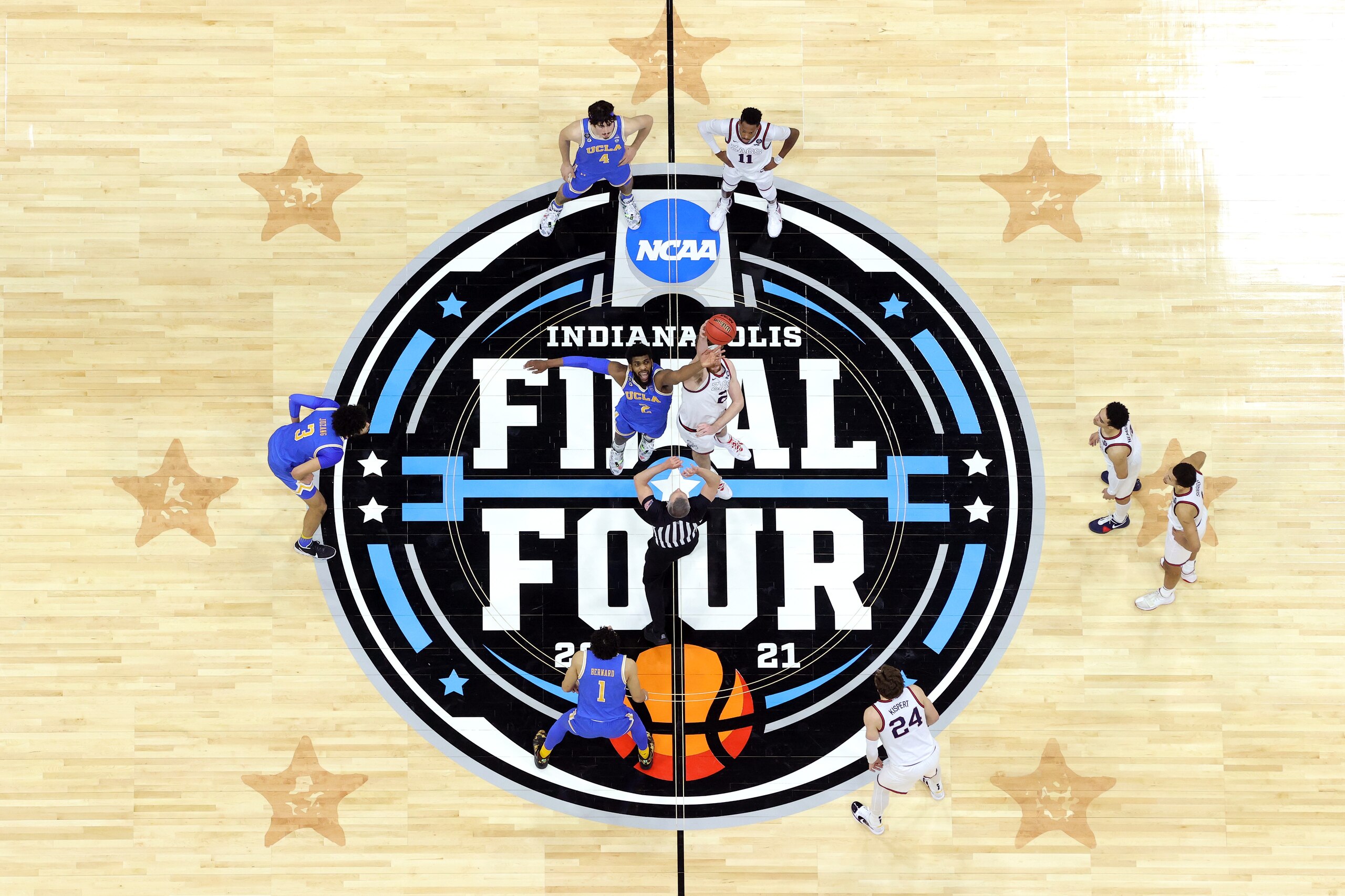 INDIANAPOLIS, INDIANA - APRIL 03: Drew Timme #2 of the Gonzaga Bulldogs and Cody Riley #2 of the UCLA Bruins compete for the opening tip-off during the 2021 NCAA Final Four semifinal at Lucas Oil Stadium on April 03, 2021 in Indianapolis, Indiana. (Photo by Andy Lyons/Getty Images)