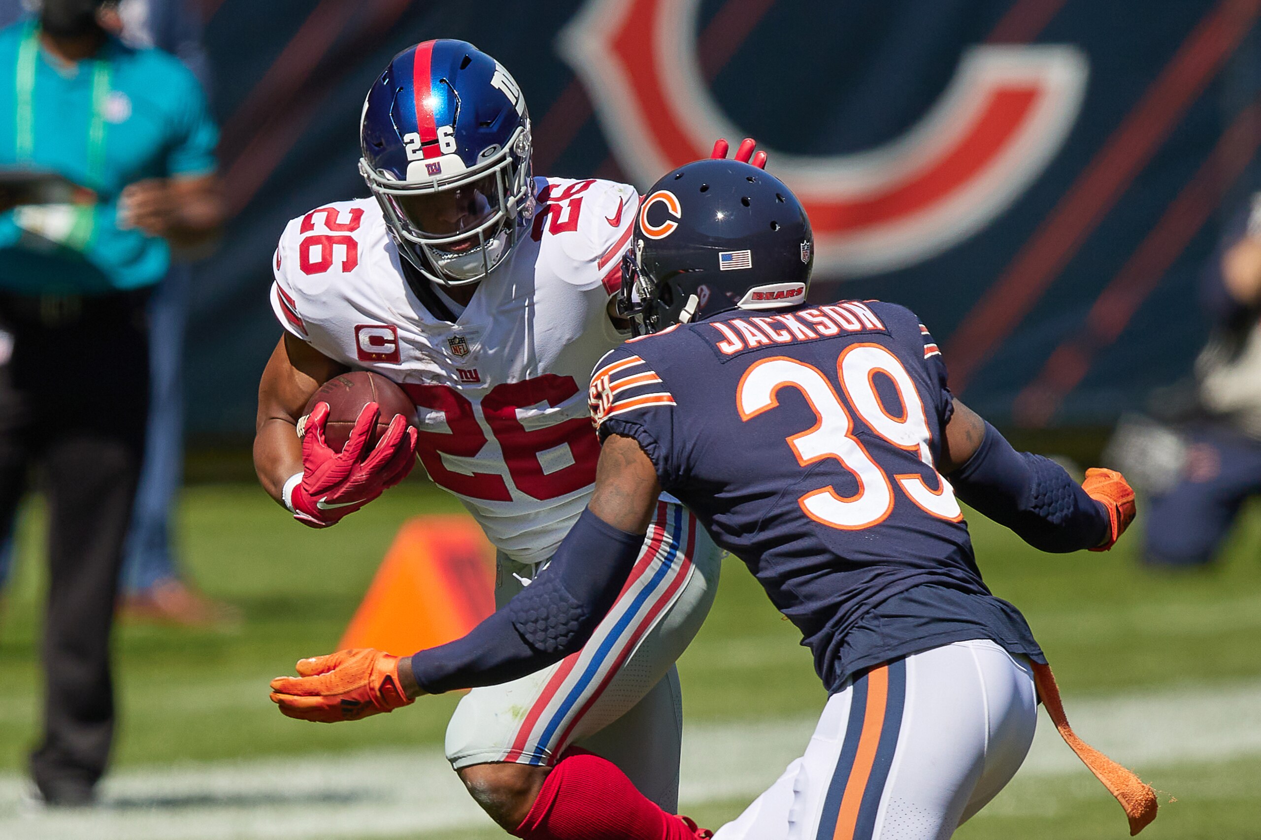 CHICAGO, IL - SEPTEMBER 20: New York Giants running back Saquon Barkley (26) battles with Chicago Bears free safety Eddie Jackson (39) in action during a game between the Chicago Bears and the New York Giants on September 20, 2020 at Soldier Field in Chicago, IL. (Photo by Robin Alam/Icon Sportswire via Getty Images)