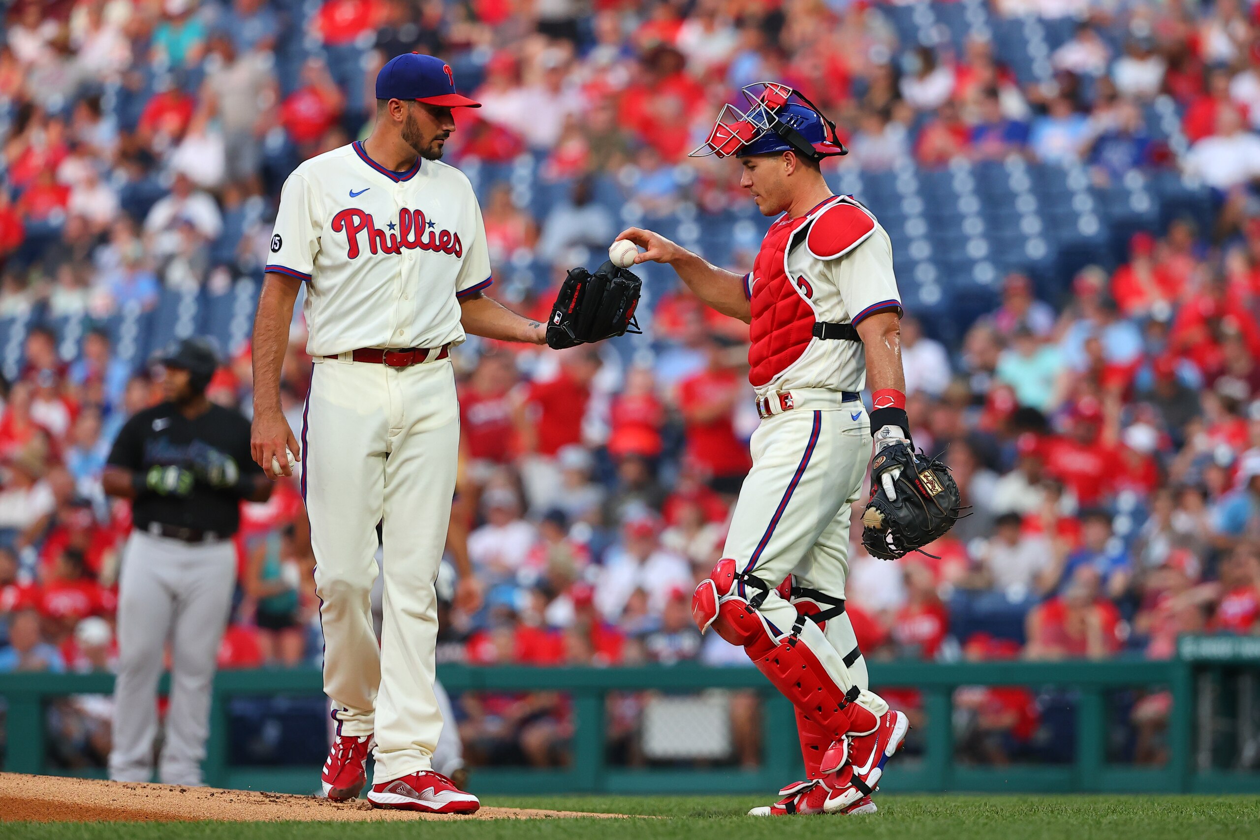 PHILADELPHIA, PA - JULY 16:  Philadelphia Phillies catcher J.T. Realmuto (10) comes to the mound to talk with Philadelphia Phillies starting pitcher Zach Eflin (56) during Game 2 of the doubleheader between the Philadelphia Phillies and the Miami Marlins on July 16, 2021 at Citizens Bank Park in Philadelphia, PA.  (Photo by Rich Graessle/Icon Sportswire via Getty Images)