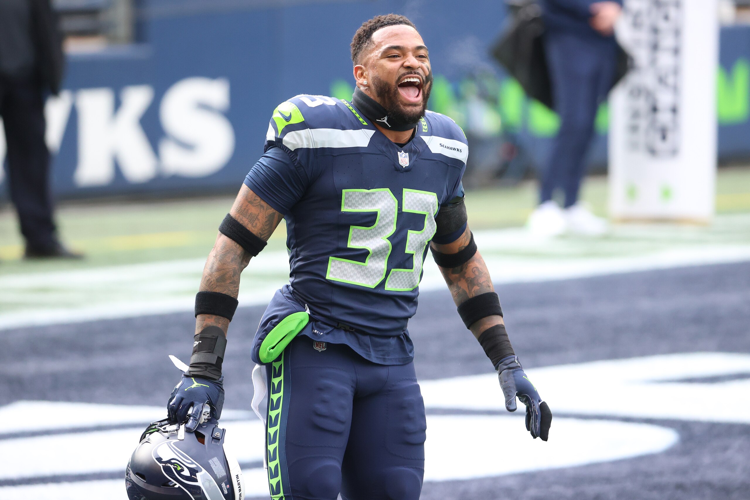 SEATTLE, WASHINGTON - JANUARY 09: Jamal Adams #33 of the Seattle Seahawks reacts during pre-game activates prior to the NFC Wild Card Playoff game against the Los Angeles Rams at Lumen Field on January 09, 2021 in Seattle, Washington. (Photo by Abbie Parr/Getty Images)