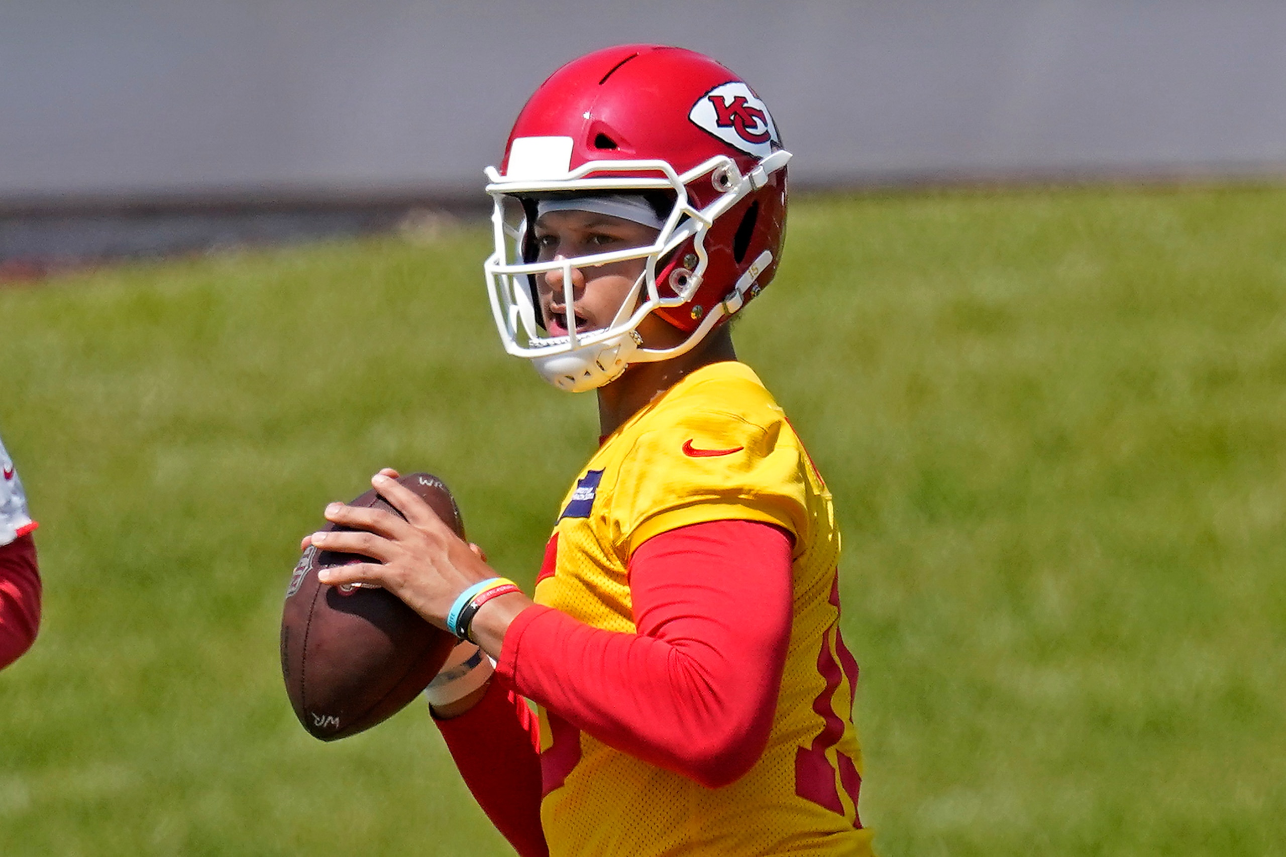 Kansas City Chiefs quarterback Patrick Mahomes passes during the NFL football team's minicamp Tuesday, June 15, 2021, in Kansas City, Mo. (AP Photo/Charlie Riedel)