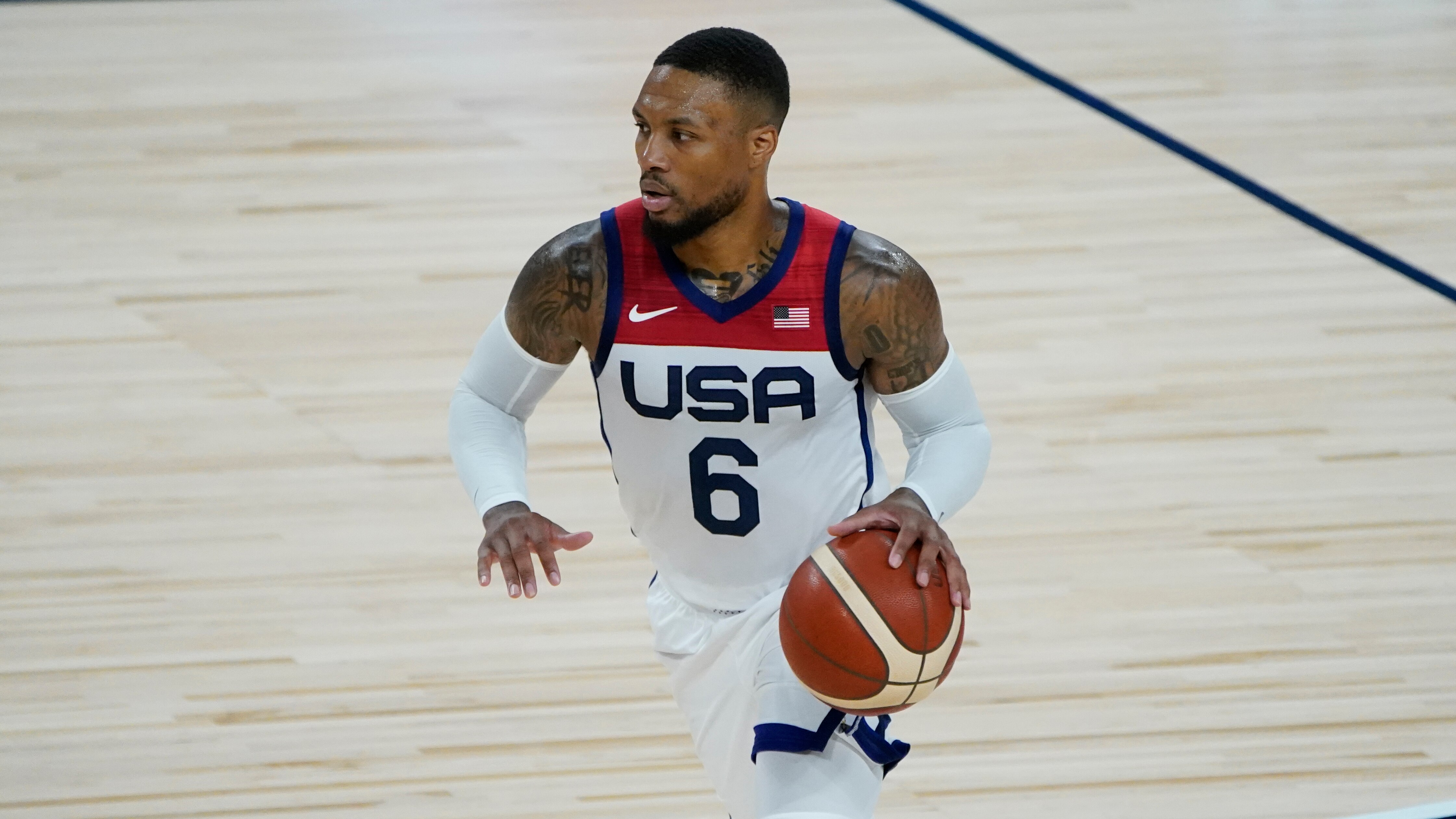 United States' Damian Lillard (6) plays against Spain during the first half of an exhibition basketball game in preparation for the Olympics, Sunday, July 18, 2021, in Las Vegas. (AP Photo/John Locher)