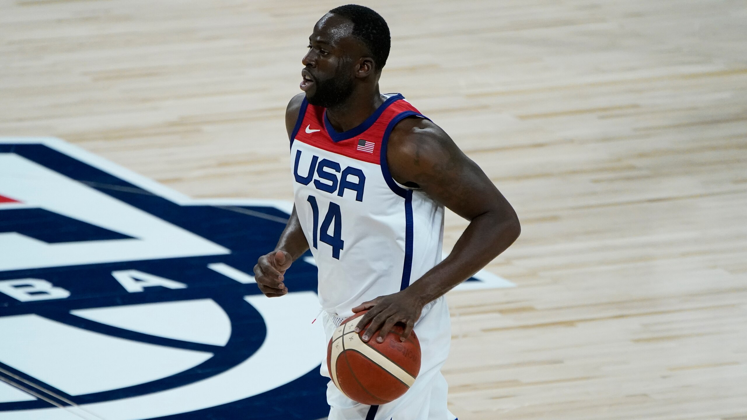 United States' Draymond Green (14) plays against Spain during the first half of an exhibition basketball game in preparation for the Olympics, Sunday, July 18, 2021, in Las Vegas. (AP Photo/John Locher)