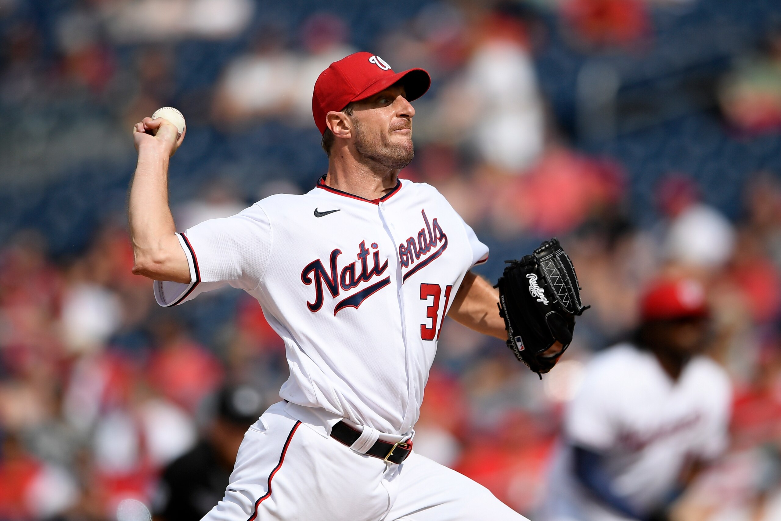 Washington Nationals starting pitcher Max Scherzer delivers a pitch during a baseball game against the San Diego Padres, Sunday, July 18, 2021, in Washington. (AP Photo/Nick Wass)