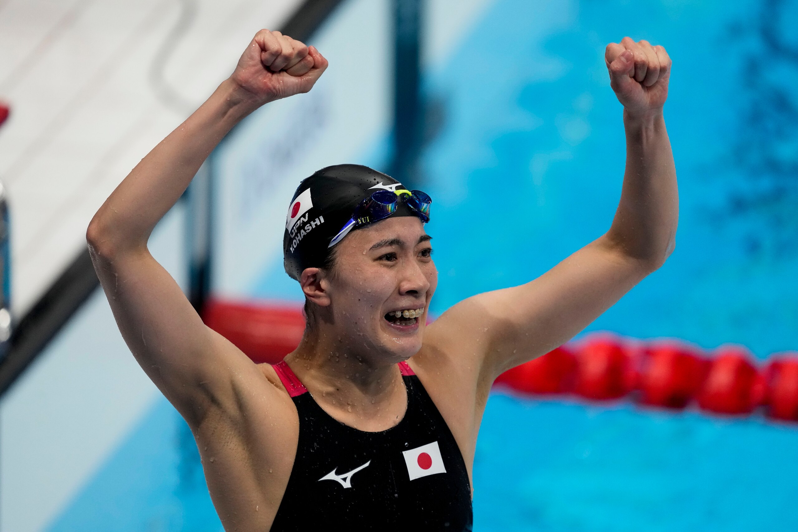 Yui Ohashi, of Japan, celebrates after winning the final of the women's 400-meter Individual medley at the 2020 Summer Olympics, Sunday, July 25, 2021, in Tokyo, Japan. (AP Photo/Petr David Josek)