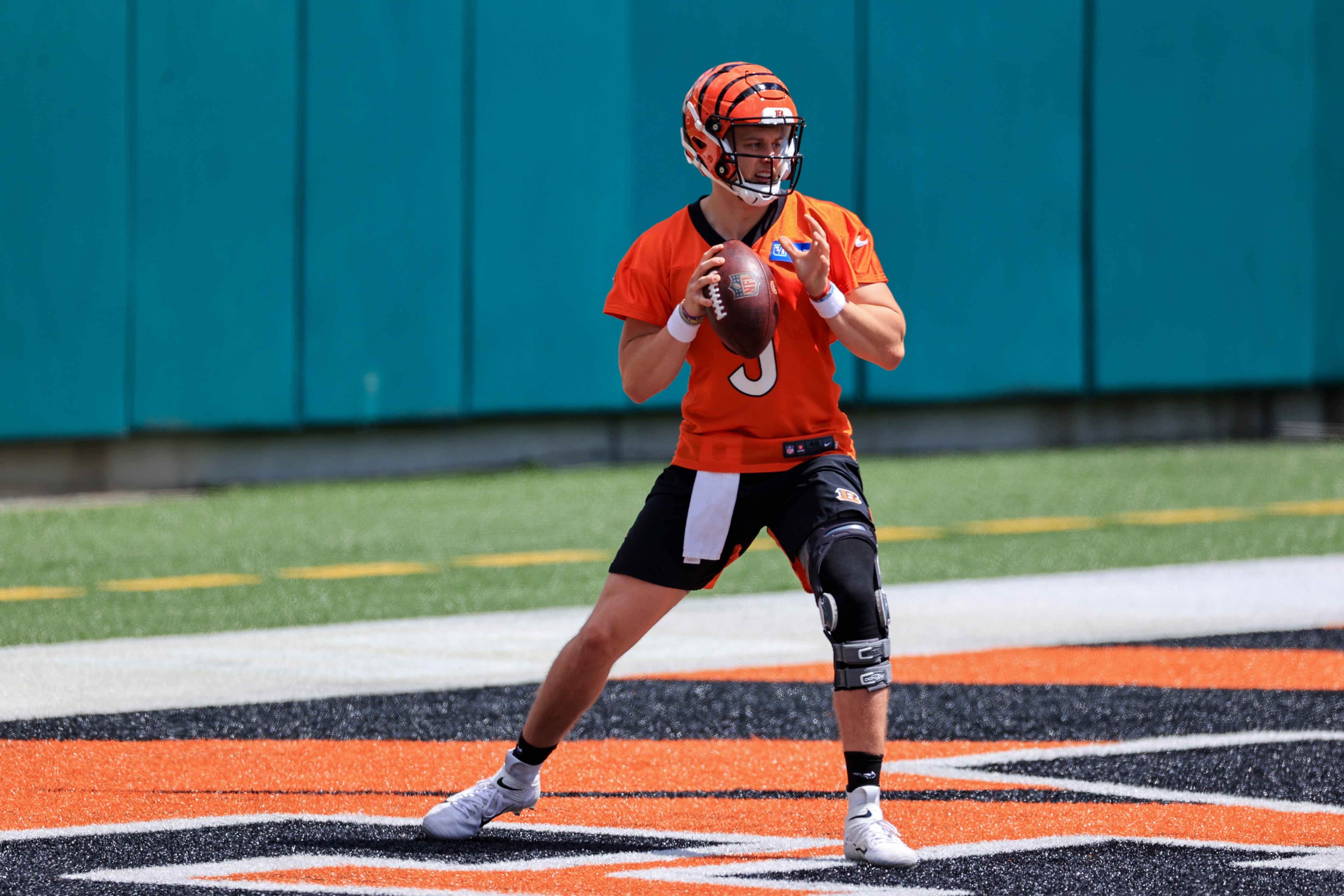Cincinnati Bengals' Joe Burrow looks to pass in a drill during an NFL football minicamp practice in Cincinnati, Tuesday, June 15, 2021. (AP Photo/Aaron Doster)