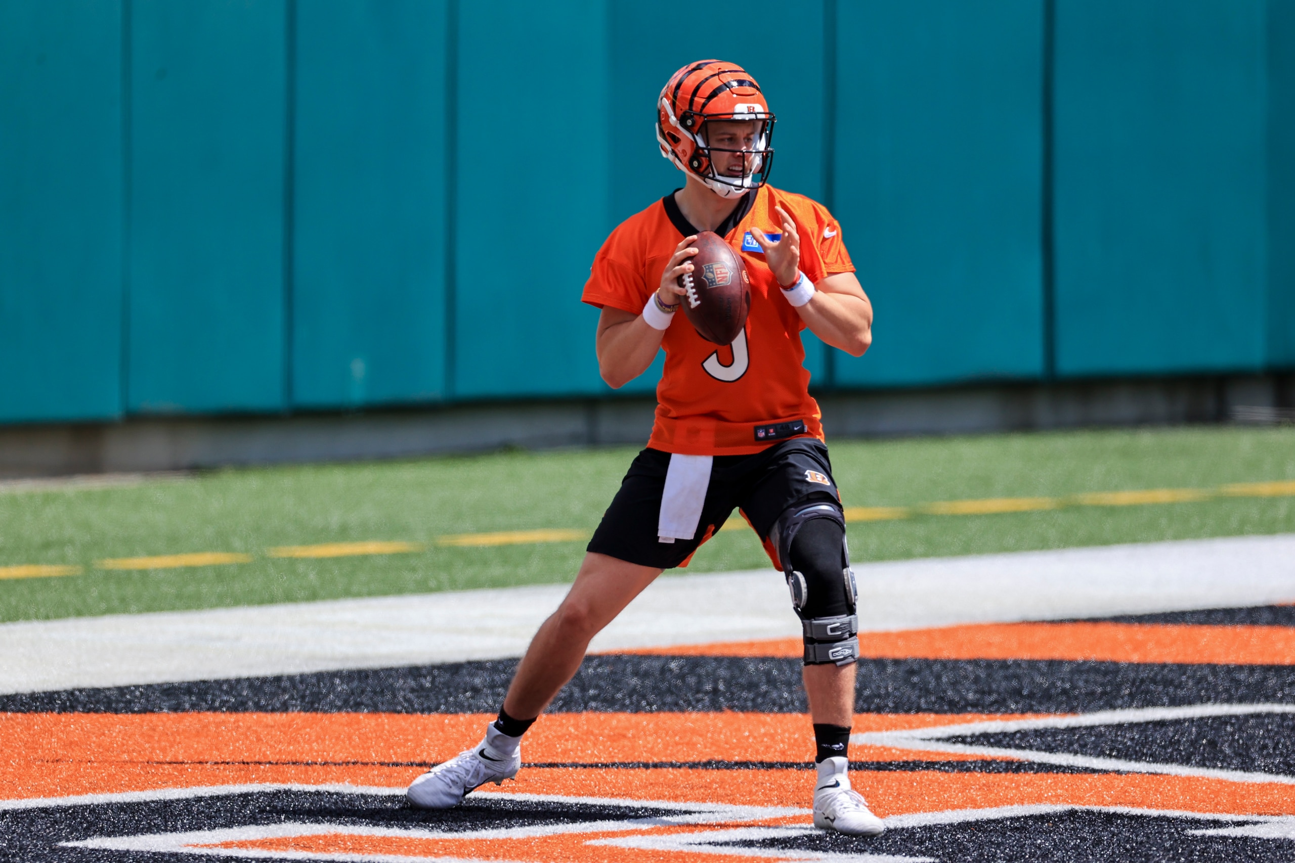 Cincinnati Bengals' Joe Burrow looks to pass in a drill during an NFL football minicamp practice in Cincinnati, Tuesday, June 15, 2021. (AP Photo/Aaron Doster)