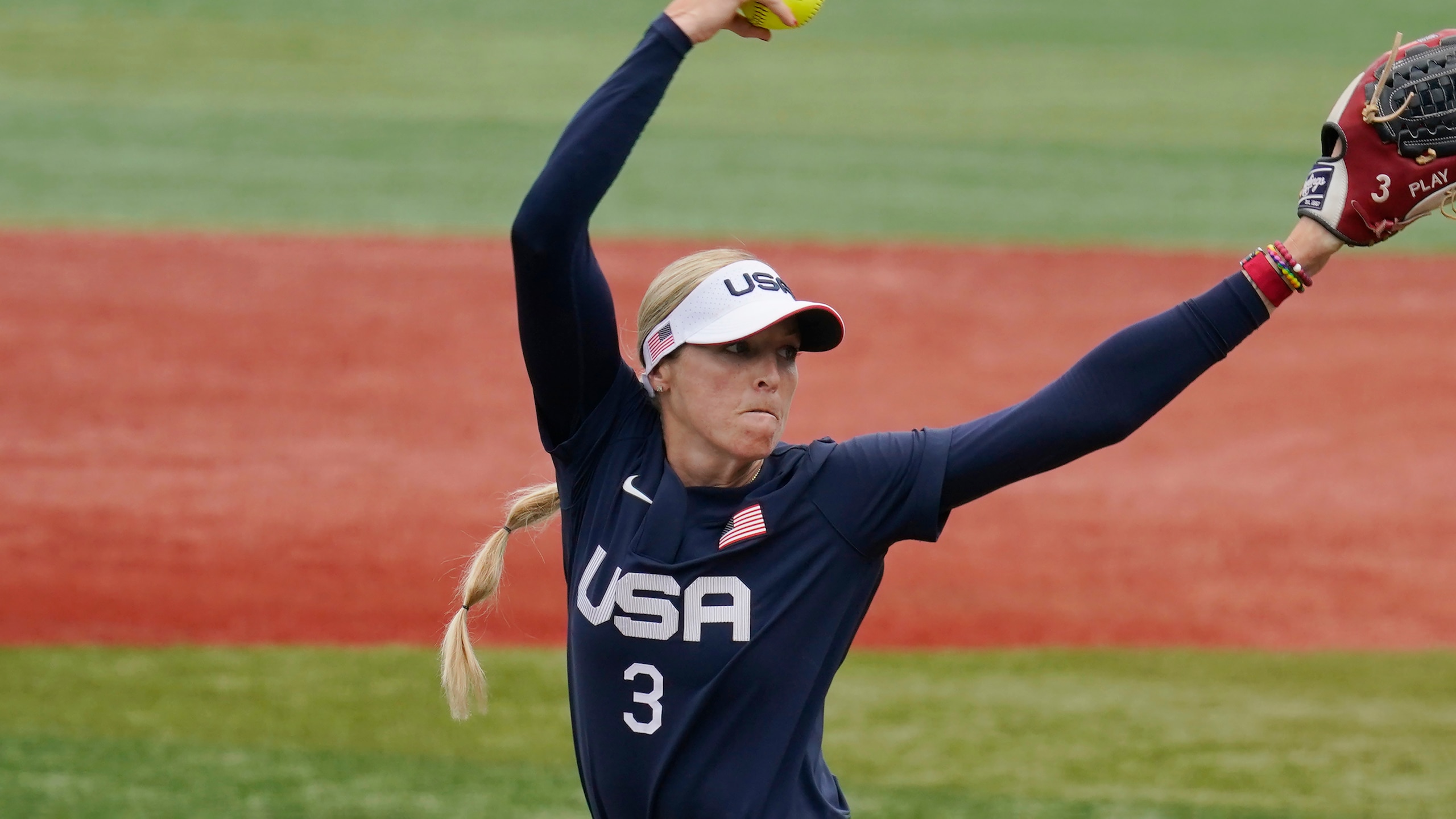 United States' Ally Carda pitches against Japan in the first inning of a softball game at the 2020 Summer Olympics, Monday, July 26, 2021, in Yokohama, Japan. (AP Photo/Sue Ogrocki)
