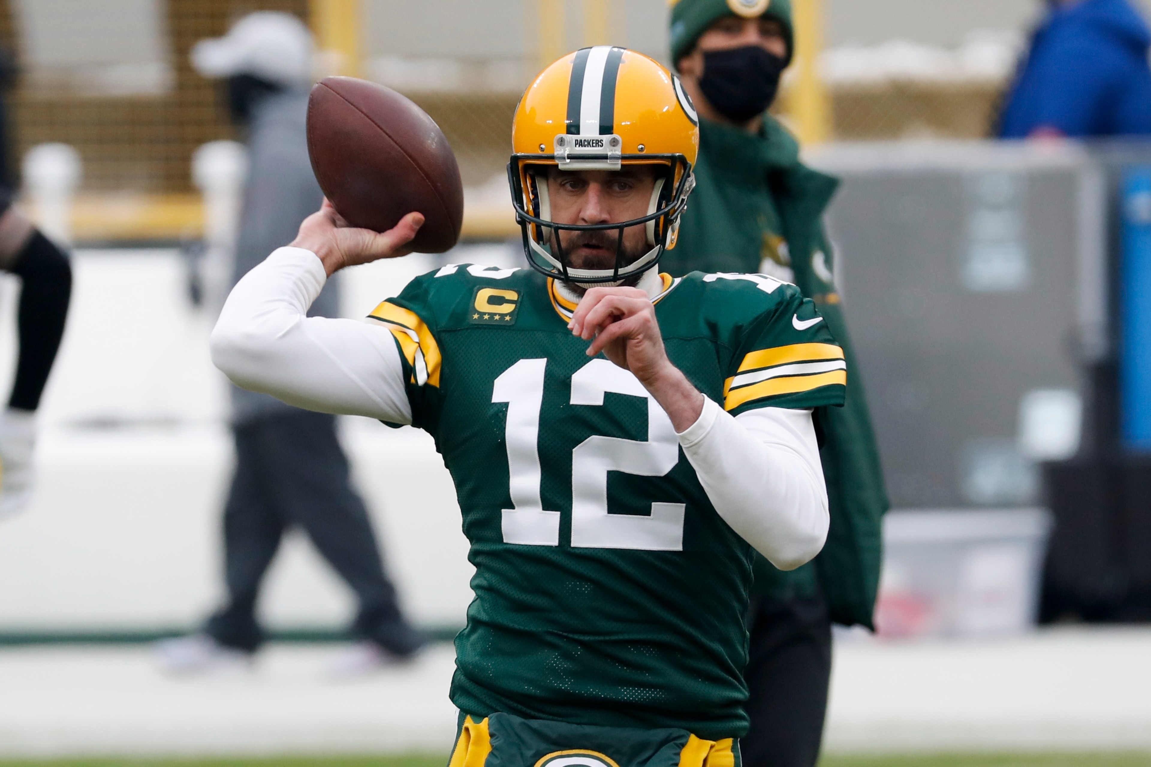 Green Bay Packers quarterback Aaron Rodgers warms up before the NFC championship NFL football game against the Tampa Bay Buccaneers in Green Bay, Wis., Sunday, Jan. 24, 2021. (AP Photo/Mike Roemer) Green Bay Packers quarterback Aaron Rodgers warms up before the NFC championship NFL football game against the Tampa Bay Buccaneers in Green Bay, Wis., Sunday, Jan. 24, 2021. (AP Photo/Mike Roemer)