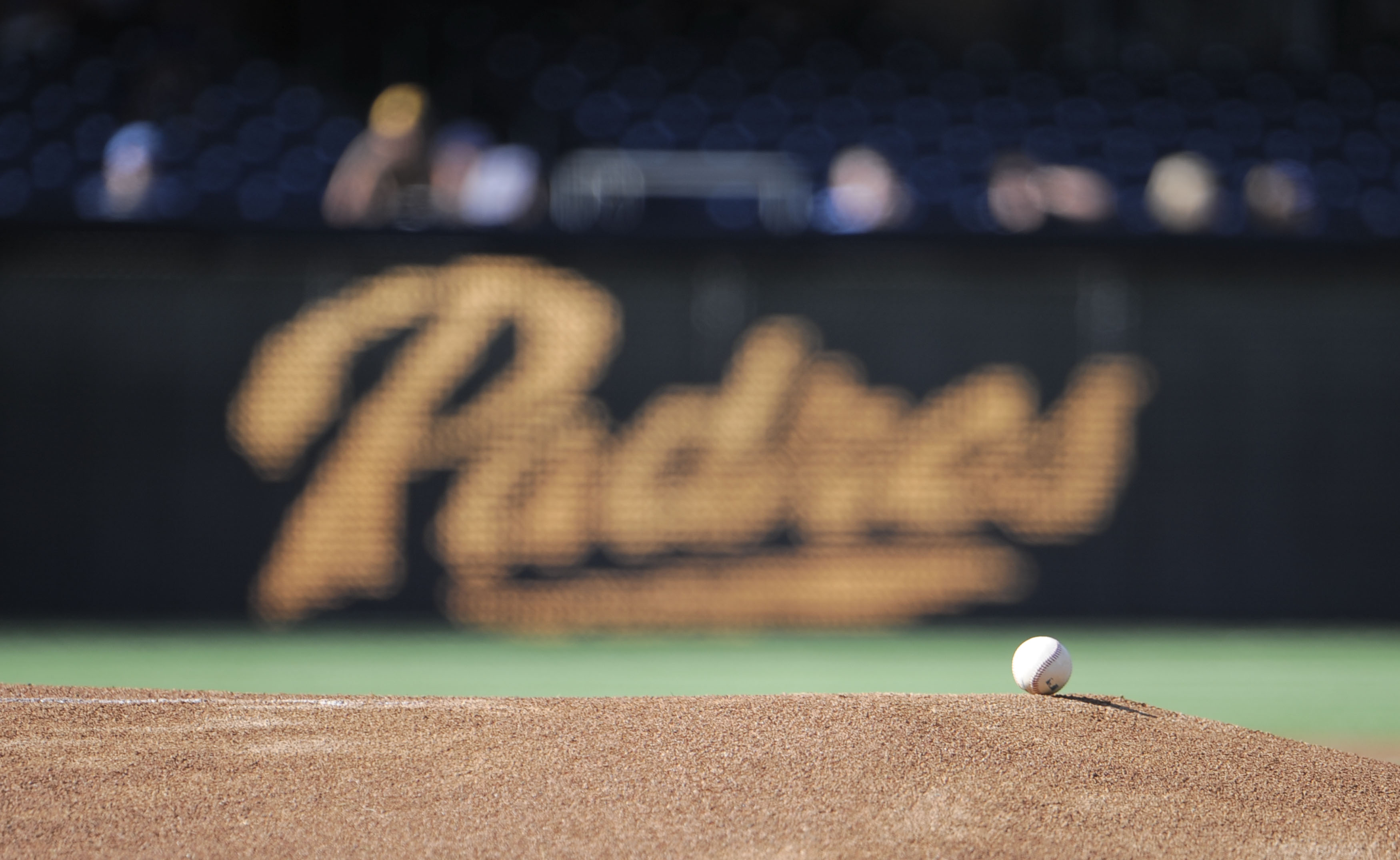 SAN DIEGO, CA - SEPTEMBER 26:  A ball sits on the mound in front of a San Diego Padres logo before a baseball game between the San Diego Padres and Los Angeles Dodgers at Petco Park on September 26, 2012 in San Diego, California.  (Photo by Denis Poroy/Getty Images)