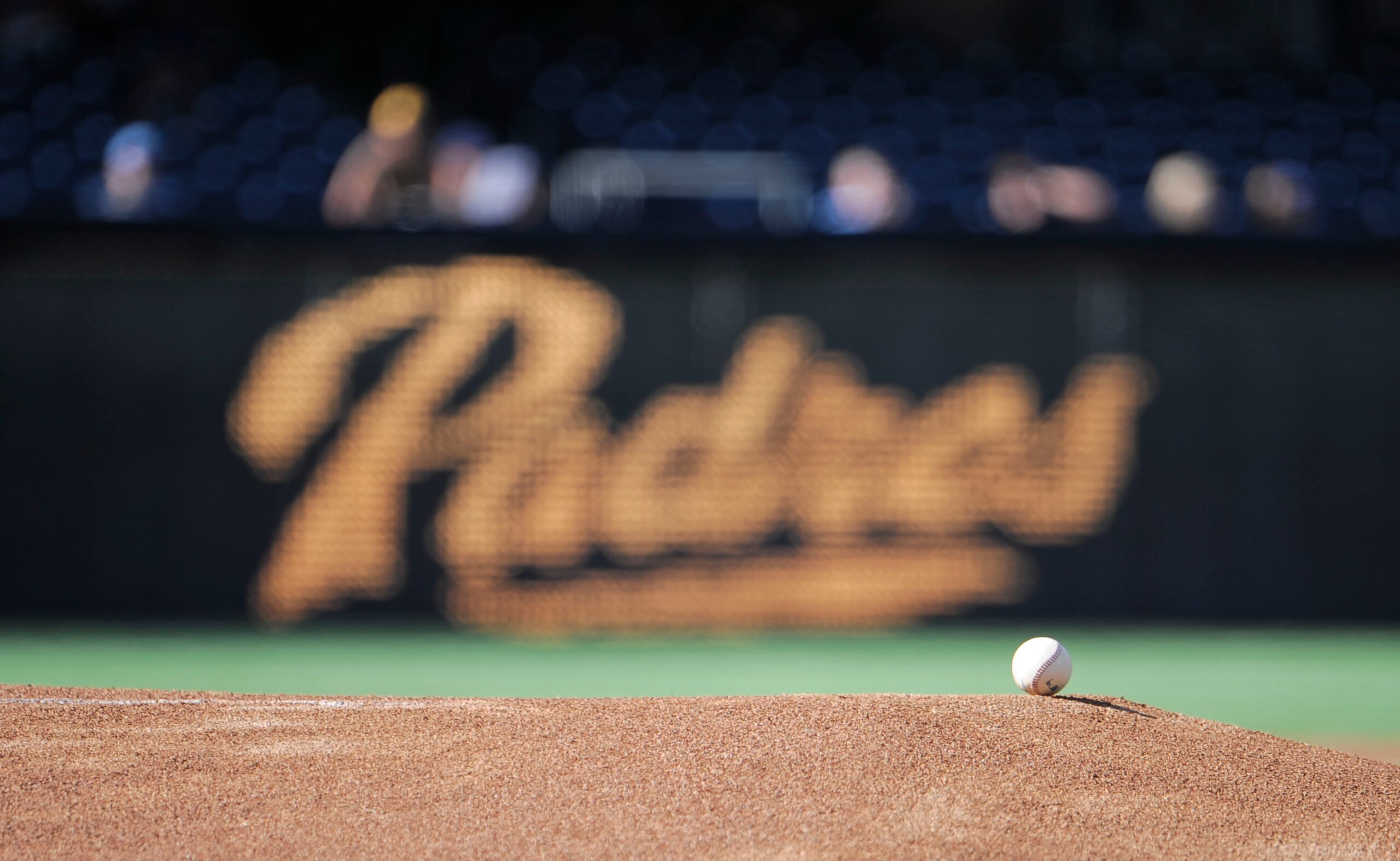 SAN DIEGO, CA - SEPTEMBER 26:  A ball sits on the mound in front of a San Diego Padres logo before a baseball game between the San Diego Padres and Los Angeles Dodgers at Petco Park on September 26, 2012 in San Diego, California.  (Photo by Denis Poroy/Getty Images)
