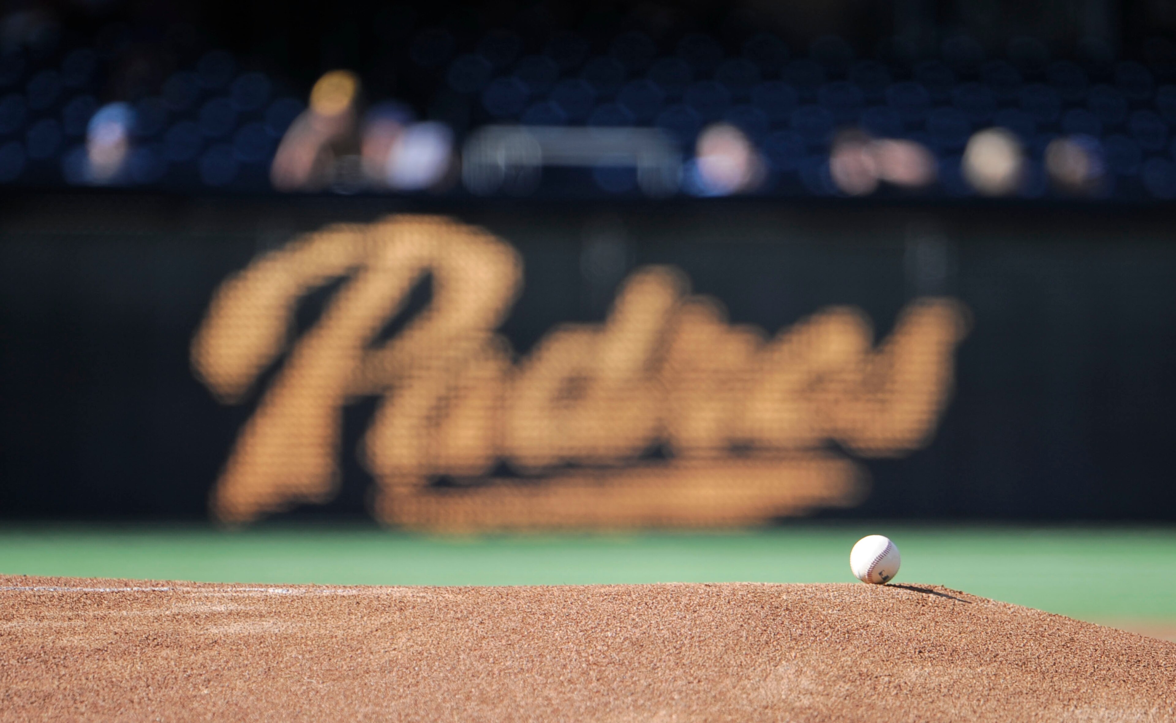 SAN DIEGO, CA - SEPTEMBER 26:  A ball sits on the mound in front of a San Diego Padres logo before a baseball game between the San Diego Padres and Los Angeles Dodgers at Petco Park on September 26, 2012 in San Diego, California.  (Photo by Denis Poroy/Getty Images)