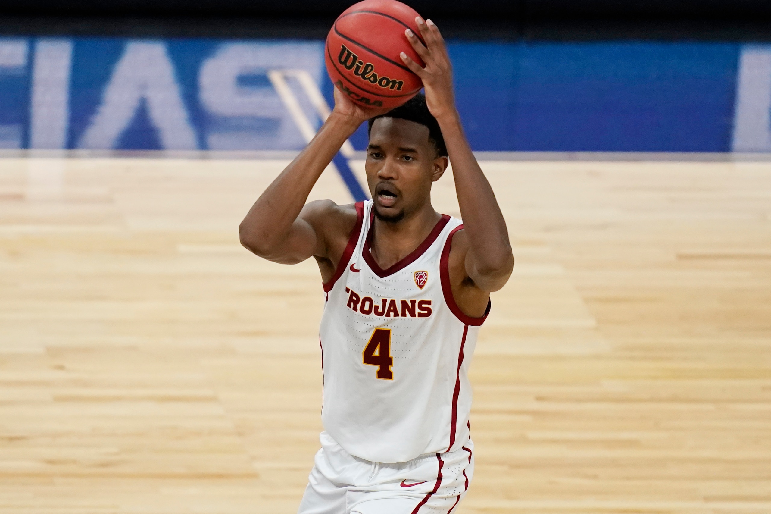 Southern California's Evan Mobley (4) plays against Utah in an NCAA college basketball game in the quarterfinal round of the Pac-12 men's tournament Thursday, March 11, 2021, in Las Vegas. (AP Photo/John Locher)