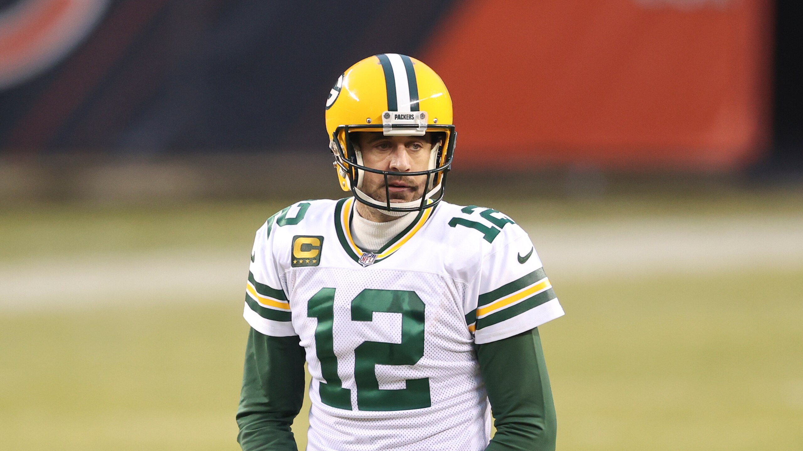 Green Bay Packers quarterback Aaron Rodgers (12) in action during the first half of an NFL football game against the Chicago Bears, Sunday, Jan. 3, 2021, in Chicago. (AP Photo/Kamil Krzaczynski)
