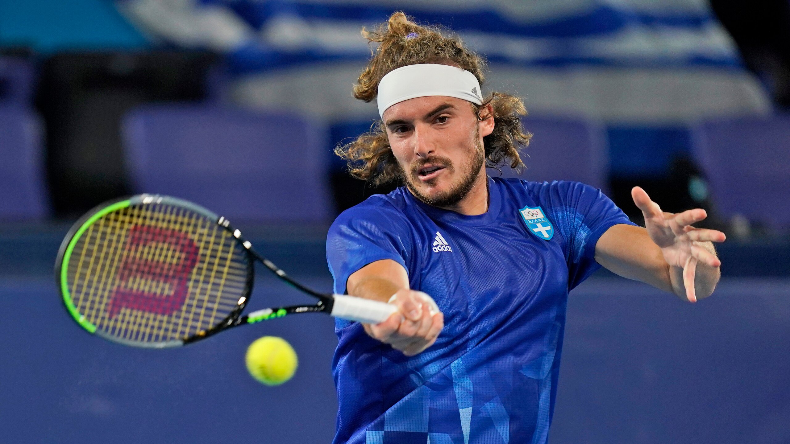 Stefanos Tsitsipas, of Greece, plays Frances Tiafoe, of the United States, during the second round of the tennis competition at the 2020 Summer Olympics, Tuesday, July 27, 2021, in Tokyo, Japan. (AP Photo/Seth Wenig)