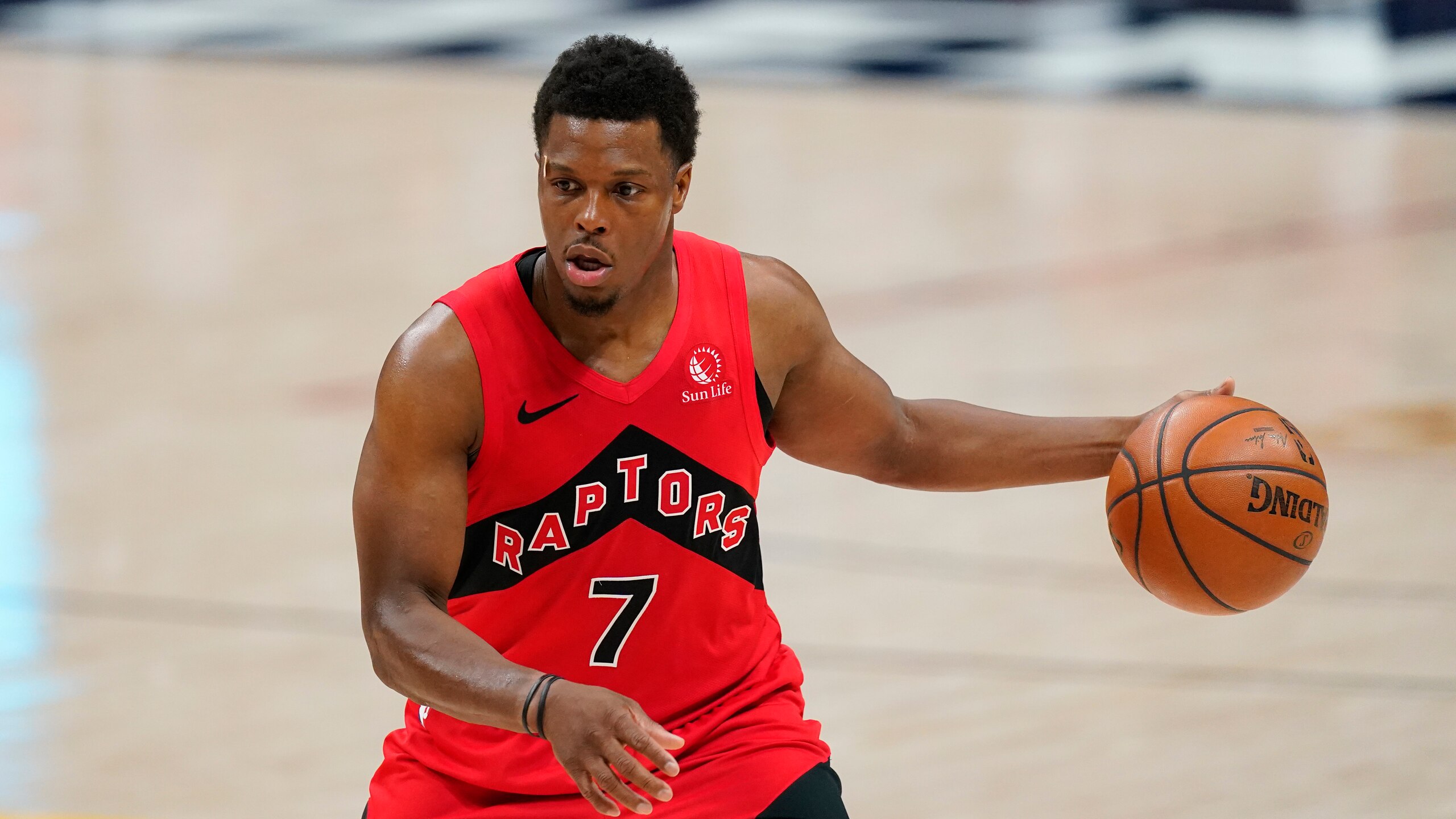 Toronto Raptors guard Kyle Lowry (7) in the second half of an NBA basketball game Thursday, April 29, 2021, in Denver. (AP Photo/David Zalubowski)