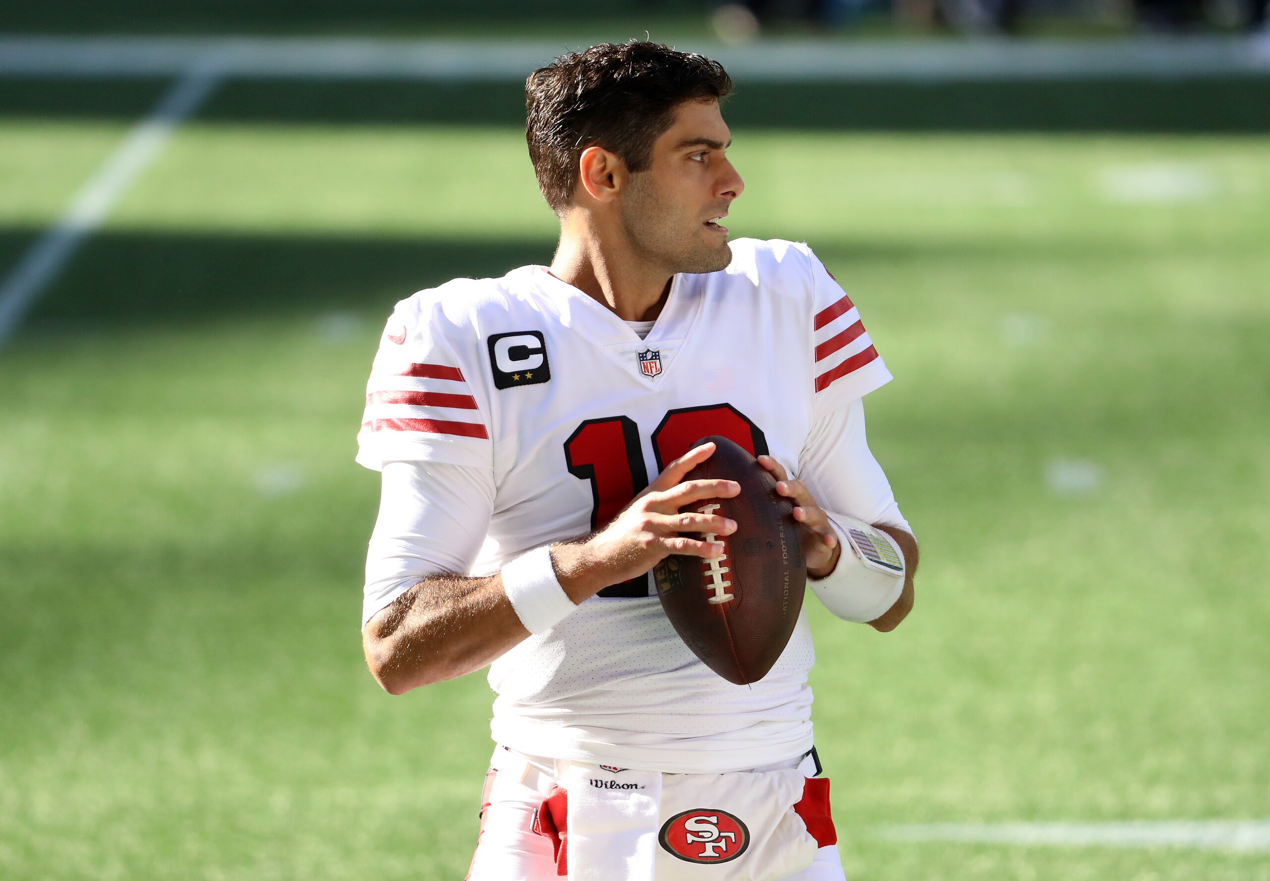SEATTLE, WASHINGTON - NOVEMBER 01: Quarterback Jimmy Garoppolo #10 of the San Francisco 49ers warms up before taking on the Seattle Seahawks at CenturyLink Field on November 01, 2020 in Seattle, Washington. (Photo by Abbie Parr/Getty Images)