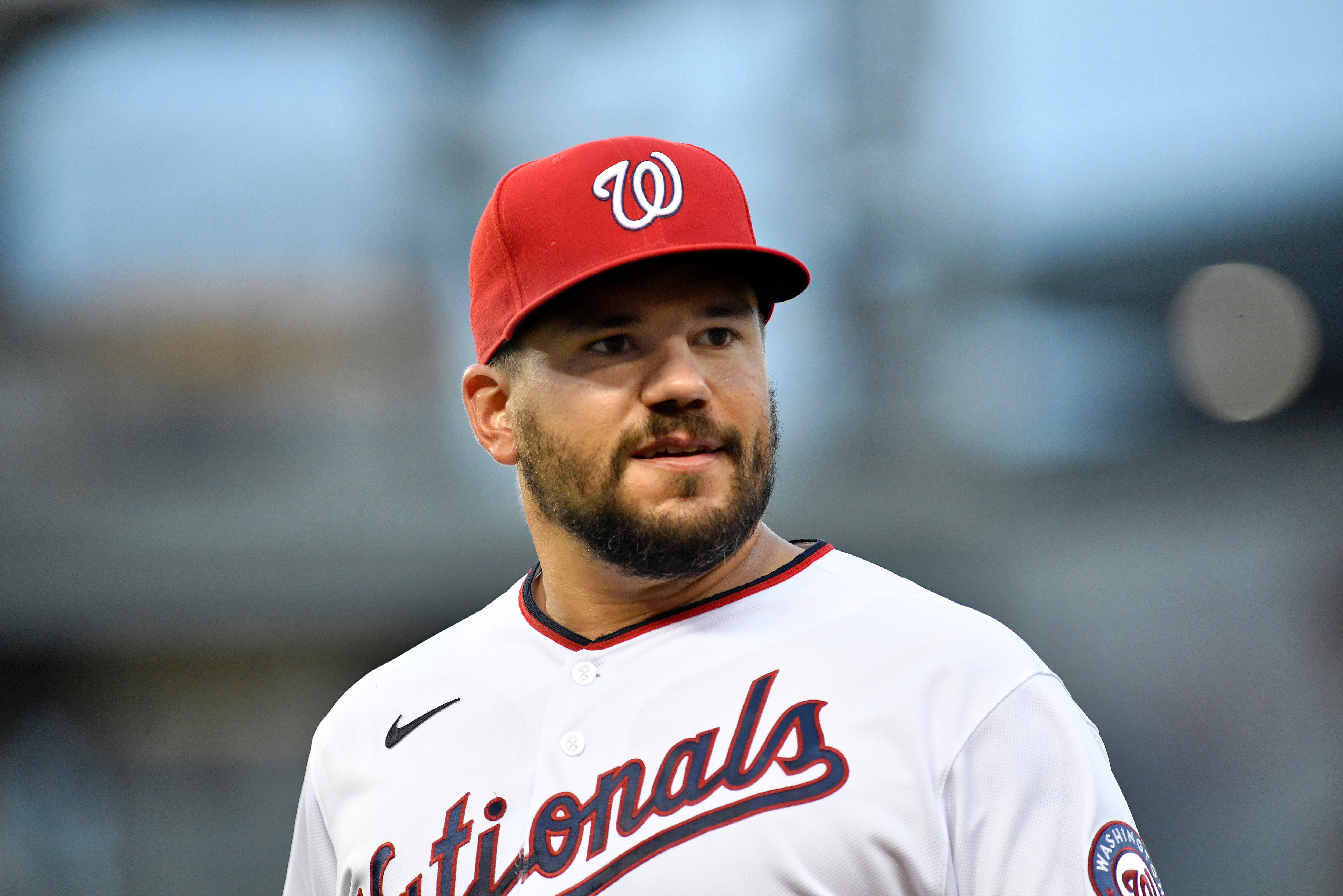 WASHINGTON, DC - JULY 01: Washington Nationals left fielder Kyle Schwarber (12) looks into the stands during the Los Angeles Dodgers versus Washington Nationals MLB game at Nationals Park on July 1, 2021 in Washington, D.C.. (Photo by Randy Litzinger/Icon Sportswire via Getty Images)