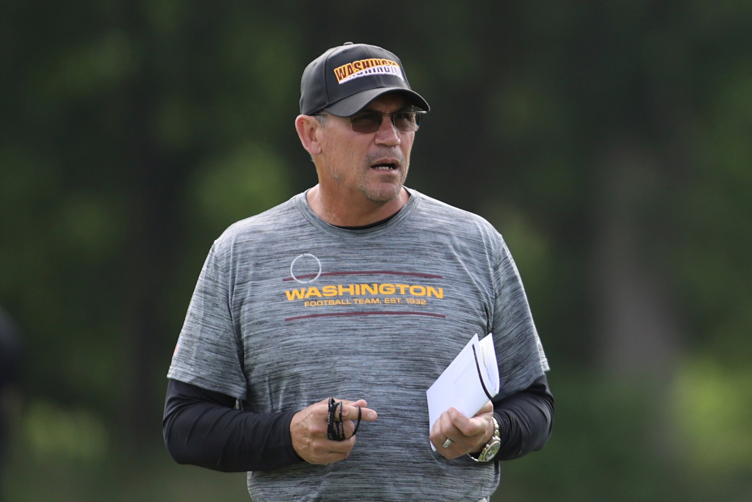 Washington Football Team head coach Ron Rivera watches during NFL football practice at Inova Sports Performance Center in Ashburn, Va., Thursday, June 10, 2021. (AP Photo/Luis M. Alvarez) Washington Football Team head coach Ron Rivera watches during NFL football practice at Inova Sports Performance Center in Ashburn, Va., Thursday, June 10, 2021. (AP Photo/Luis M. Alvarez)