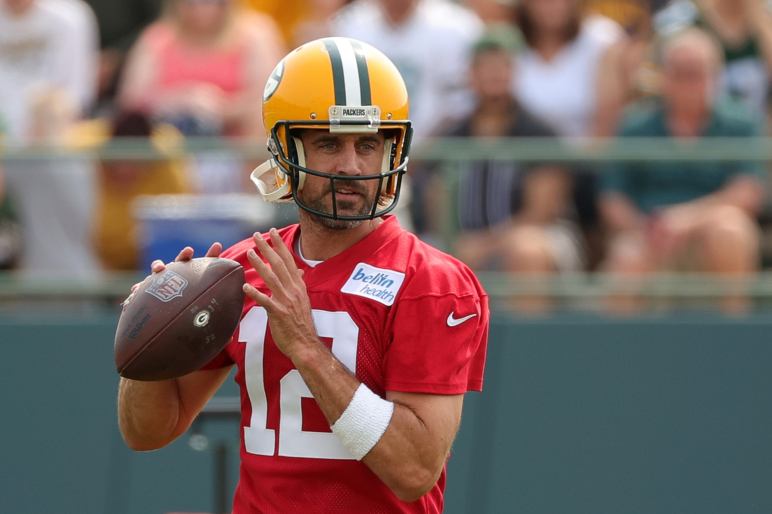 ASHWAUBENON, WISCONSIN - JULY 28:  Aaron Rodgers #12 of the Green Bay Packers works out during training camp at Ray Nitschke Field on July 28, 2021 in Ashwaubenon, Wisconsin. (Photo by Stacy Revere/Getty Images)