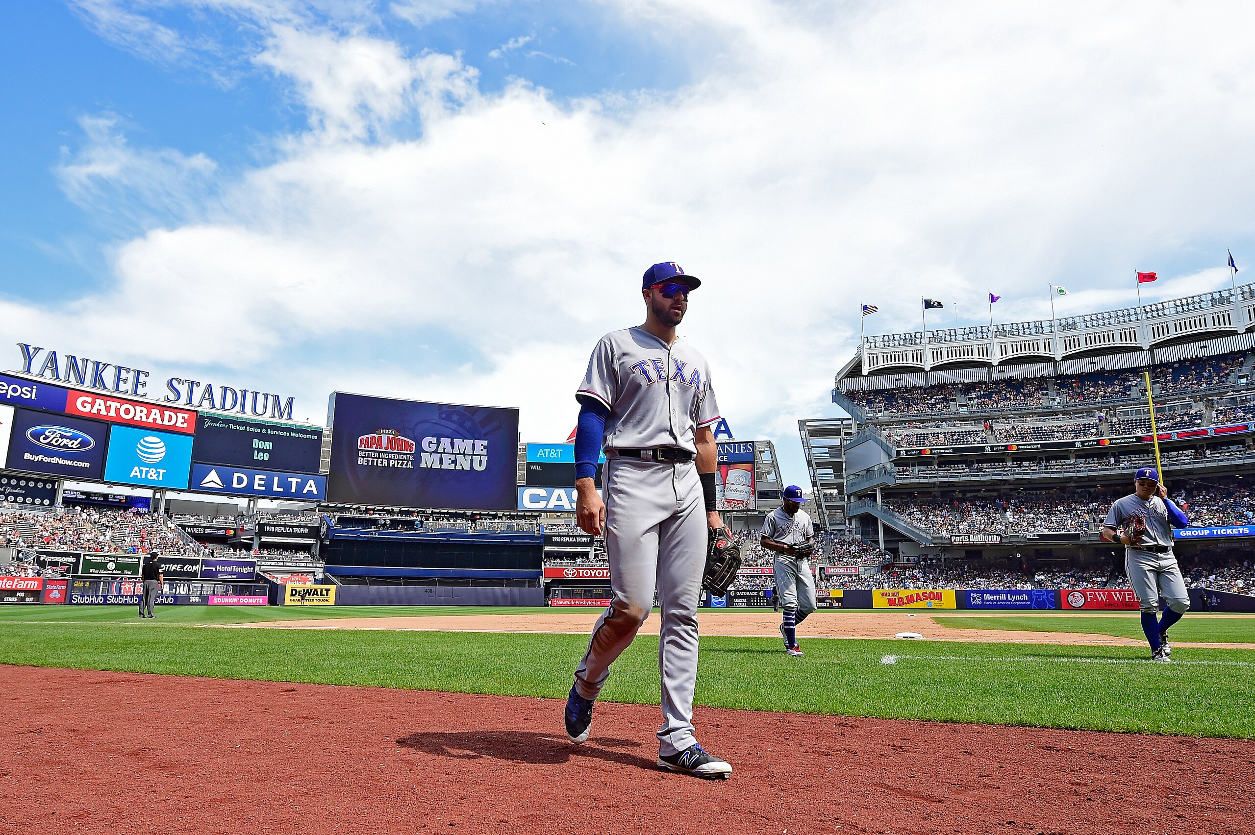 NEW YORK, NY - AUGUST 12:  Joey Gallo #13 of the Texas Rangers walks off the field after the fifth inning against the New York Yankees at Yankee Stadium on August 12, 2018 in the Bronx borough of New York City.  (Photo by Steven Ryan/Getty Images)