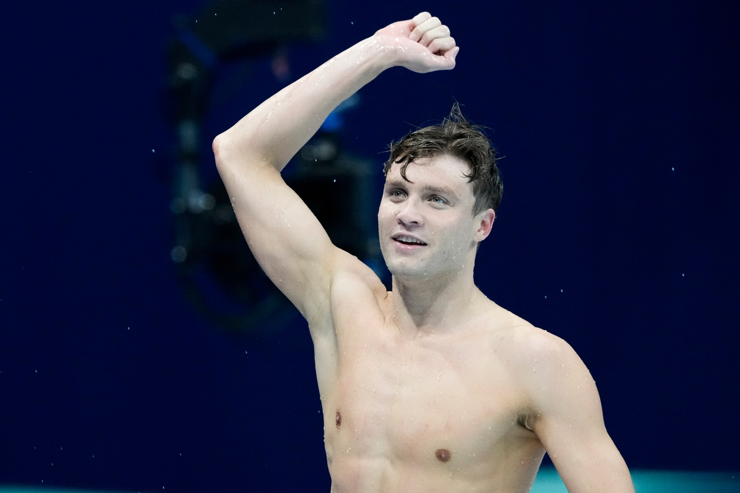 Robert Finke, of the United States, celebrates after winning the men's 800-meters freestyle final at the 2020 Summer Olympics, Thursday, July 29, 2021, in Tokyo, Japan. (AP Photo/Martin Meissner)
