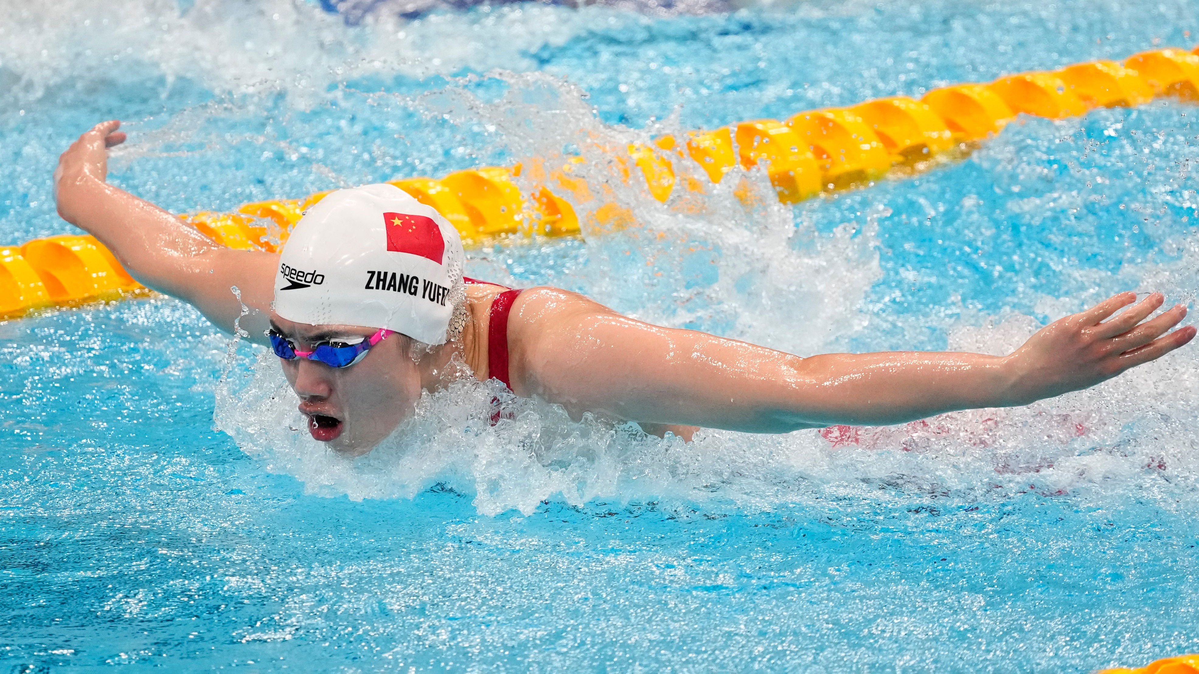 Yufei Zhang, of China, swims during a semifinal in the women's 100-meter butterfly at the 2020 Summer Olympics, Sunday, July 25, 2021, in Tokyo, Japan. (AP Photo/Petr David Josek)