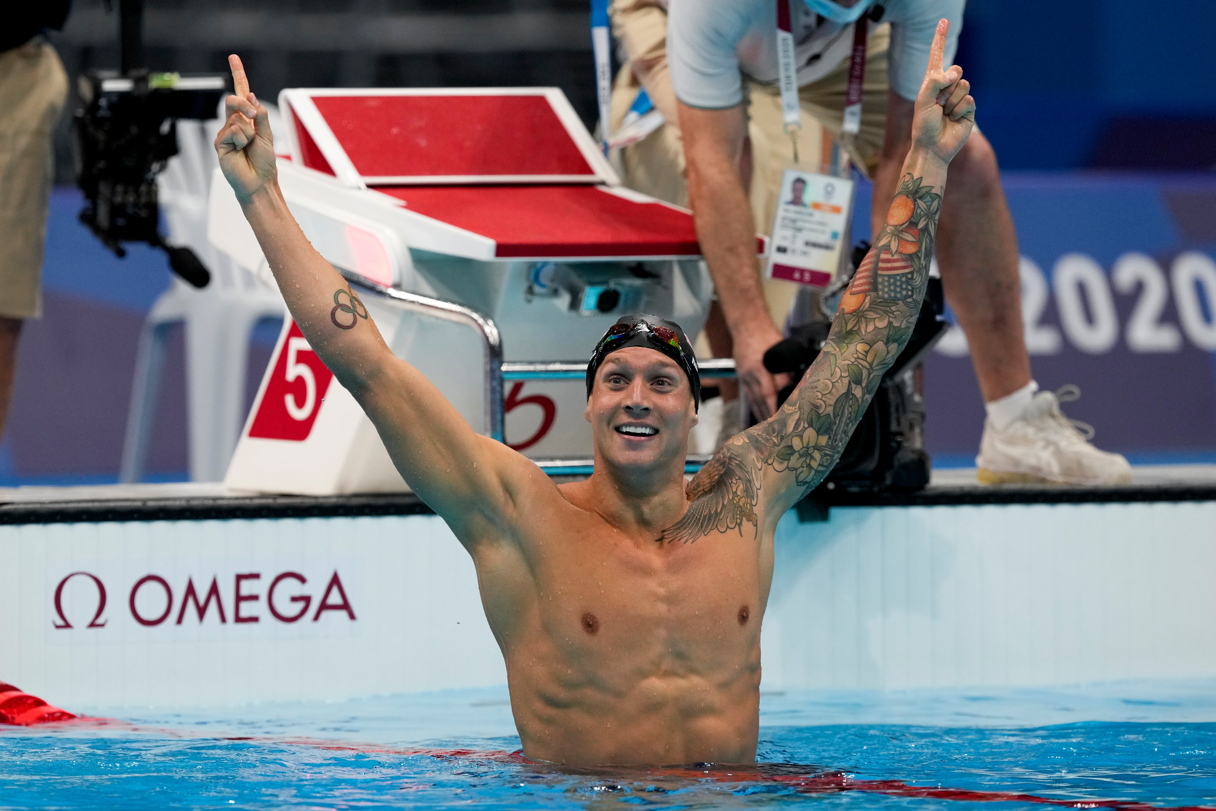 Caeleb Dressel, of the United States, celebrates after winning the men's 100-meter freestyle final at the 2020 Summer Olympics, Thursday, July 29, 2021, in Tokyo, Japan. (AP Photo/Martin Meissner)