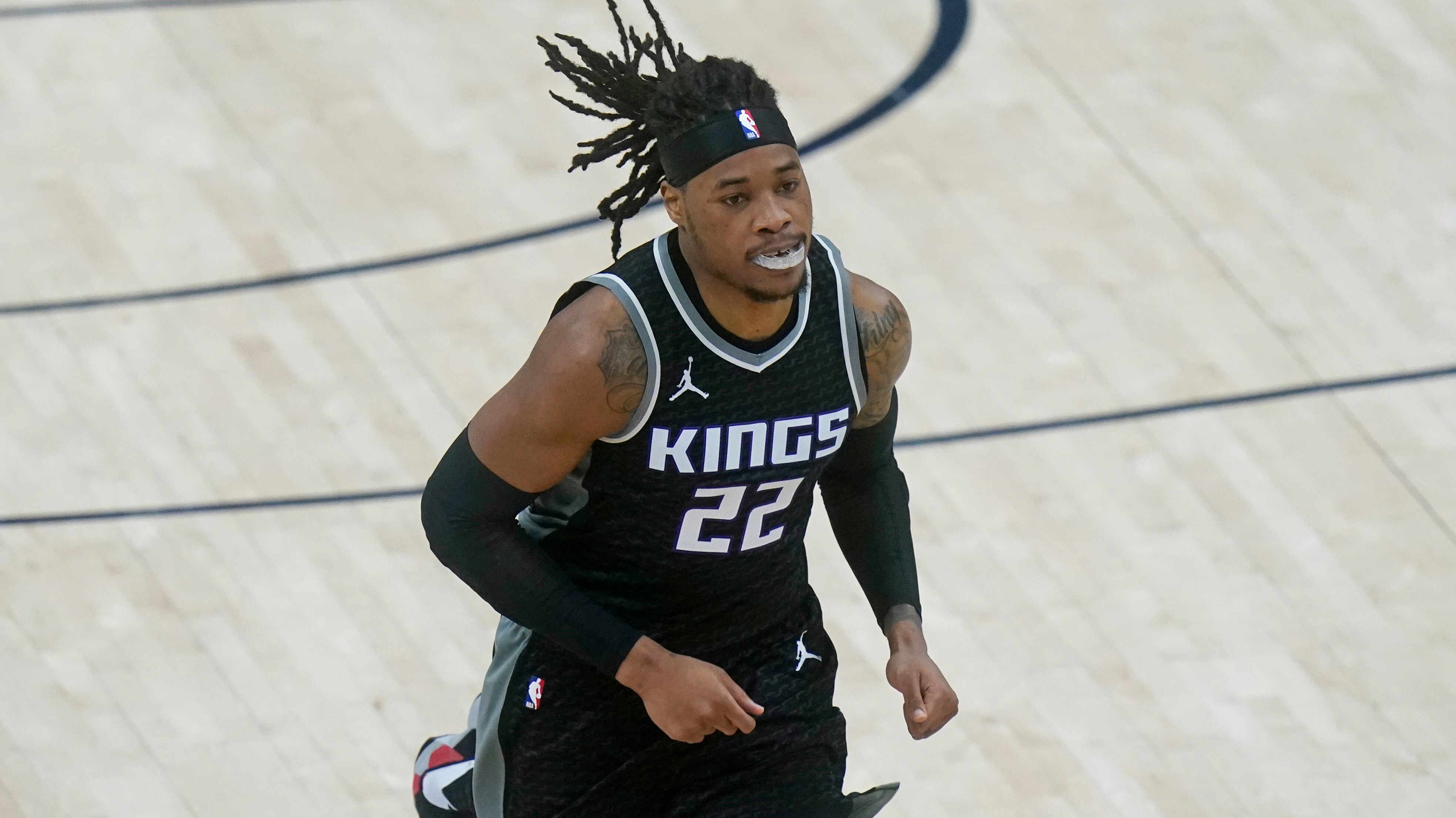 Sacramento Kings center Richaun Holmes (22) runs up court in the first half during an NBA basketball game against the Utah Jazz Saturday, April 10, 2021, in Salt Lake City. (AP Photo/Rick Bowmer)