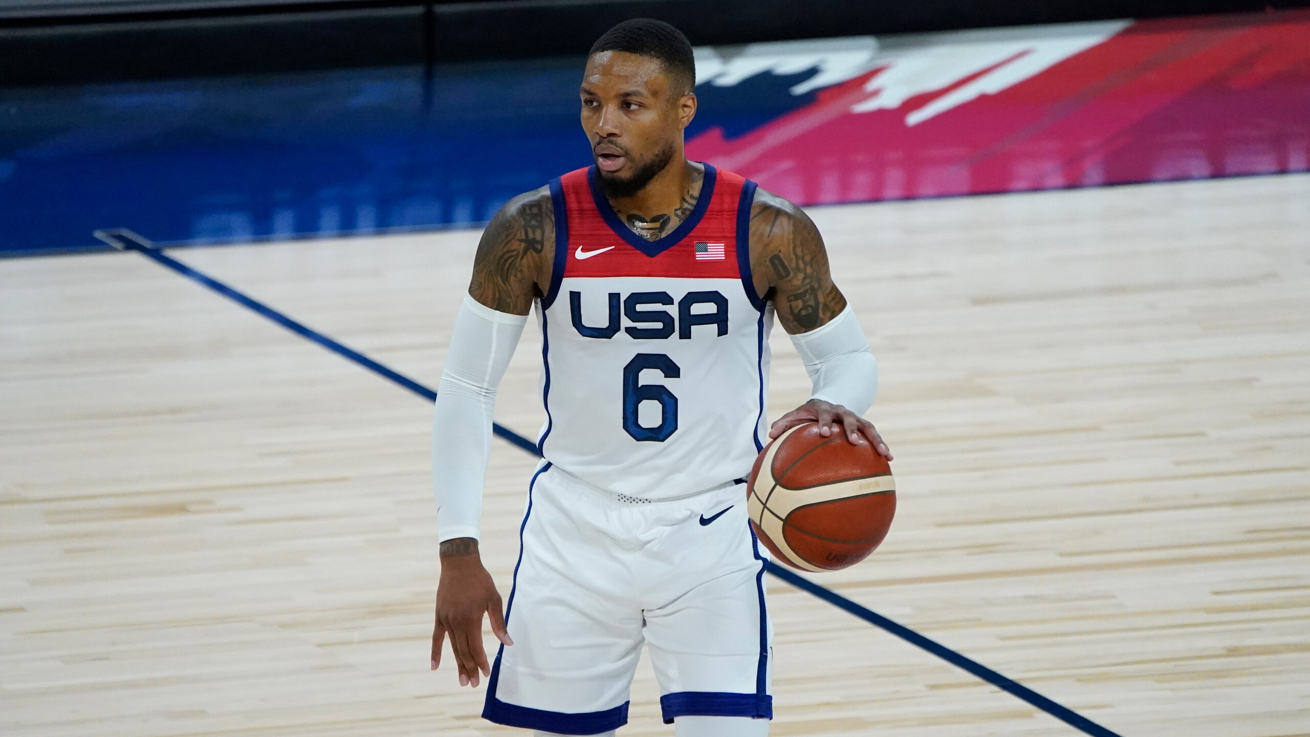 United States' Damian Lillard (6) plays against Spain during the first half of an exhibition basketball game in preparation for the Olympics, Sunday, July 18, 2021, in Las Vegas. (AP Photo/John Locher)