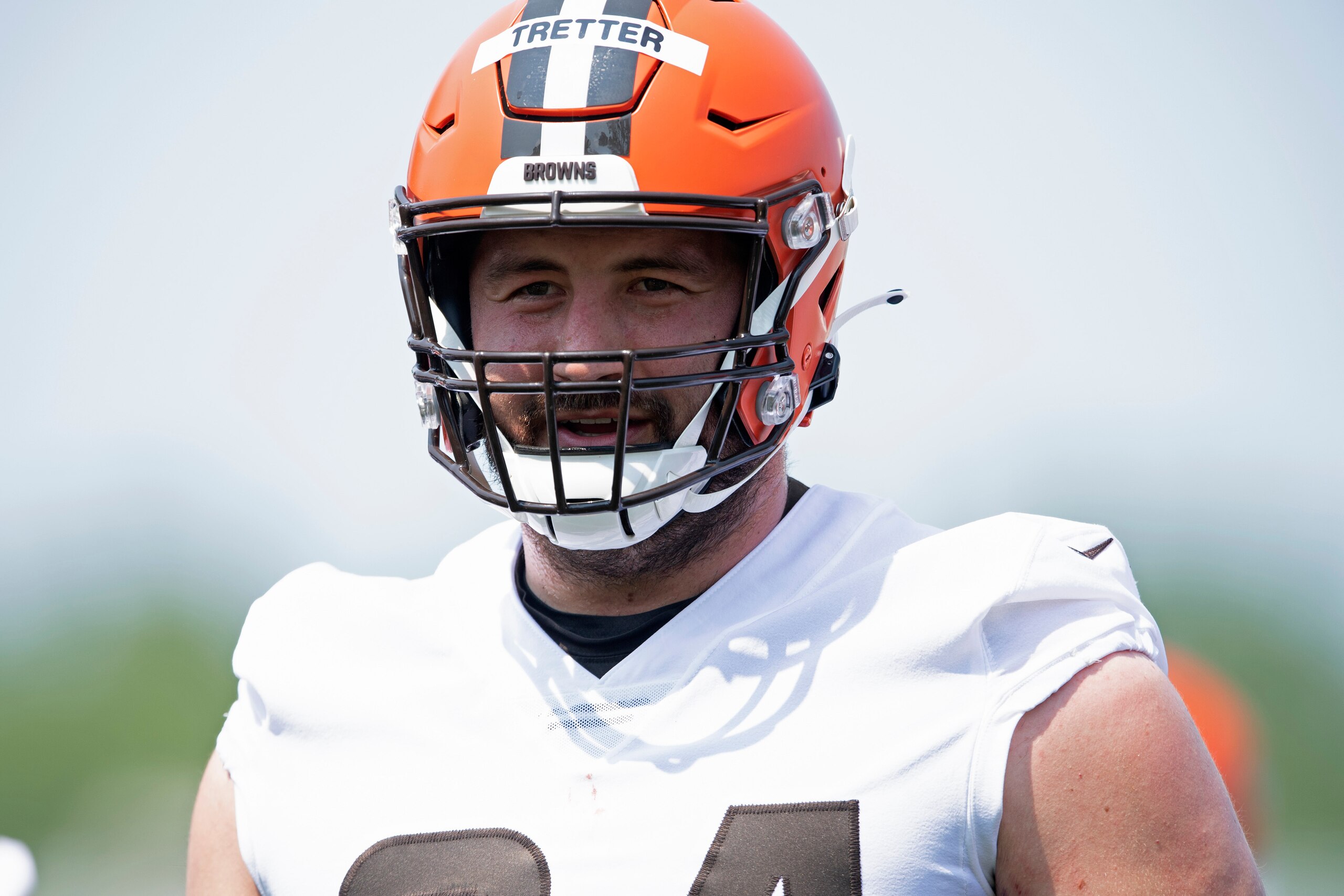 Cleveland Browns offensive linemen JC Tretter (64) smiles during an NFL football practice in Berea, Ohio, Wednesday, July 28, 2021. (AP Photo/David Dermer)