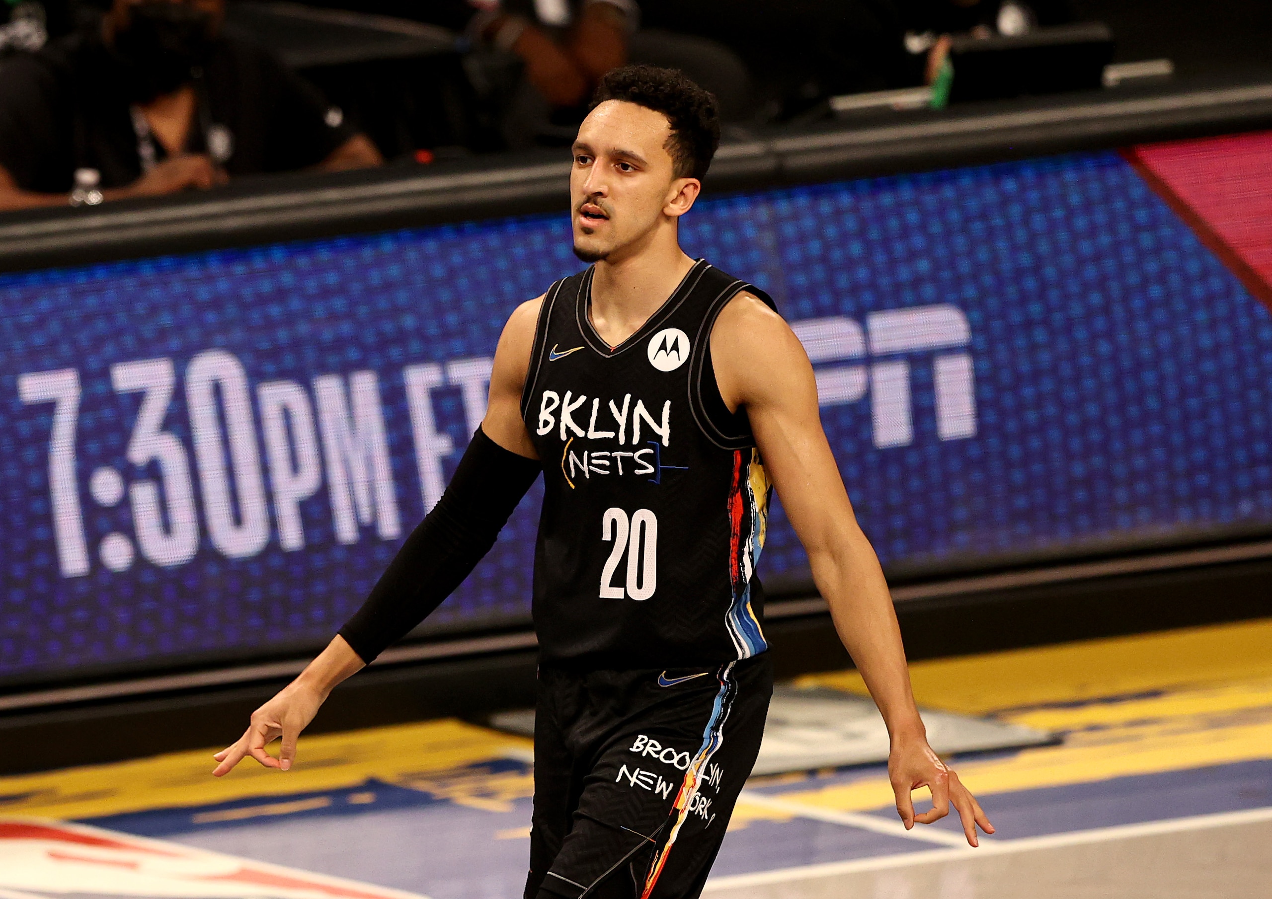 NEW YORK, NEW YORK - JUNE 07:  Landry Shamet #20 of the Brooklyn Nets celebrates his three point shot in the second half against the Milwaukee Bucks during game two of the Eastern Conference second round series at Barclays Center on June 07, 2021 in the Brooklyn borough of New York City. NOTE TO USER: User expressly acknowledges and agrees that, by downloading and or using this photograph, User is consenting to the terms and conditions of the Getty Images License Agreement. (Photo by Elsa/Getty Images)