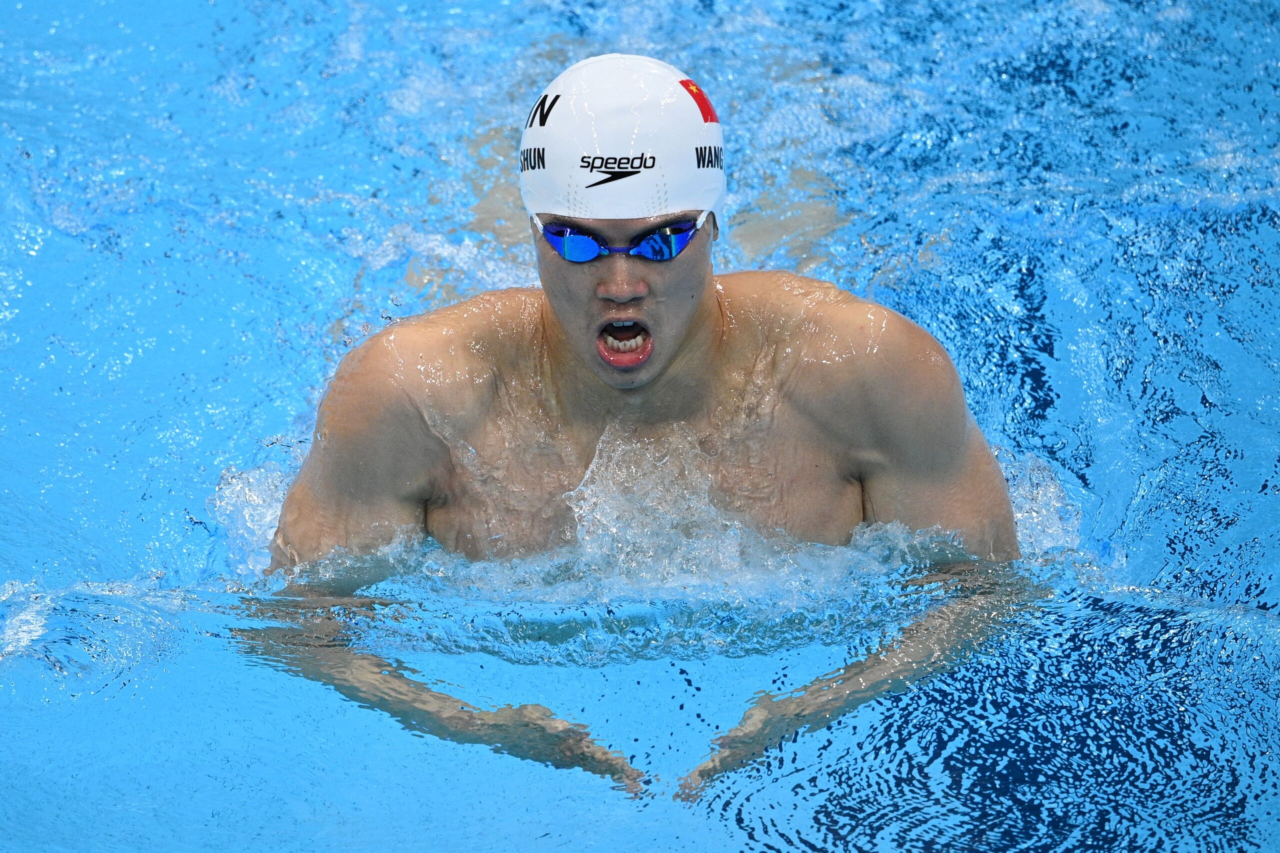 China's Wang Shun competes in a semi-final of the men's 200m individual medley swimming event during the Tokyo 2020 Olympic Games at the Tokyo Aquatics Centre in Tokyo on July 29, 2021. (Photo by Oli SCARFF / AFP) (Photo by OLI SCARFF/AFP via Getty Images)