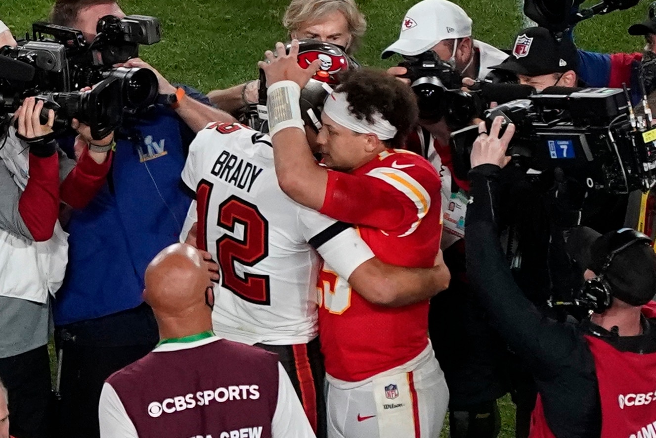 Tampa Bay Buccaneers' Tom Brady (12) and Kansas City Chiefs' Patrick Mahomes (15) greet following the NFL Super Bowl 55 football game Sunday, Feb. 7, 2021, in Tampa, Fla. The Buccaneers defeated the Chiefs 31-9 to win the Super Bowl. (AP Photo/Chris Carlson)