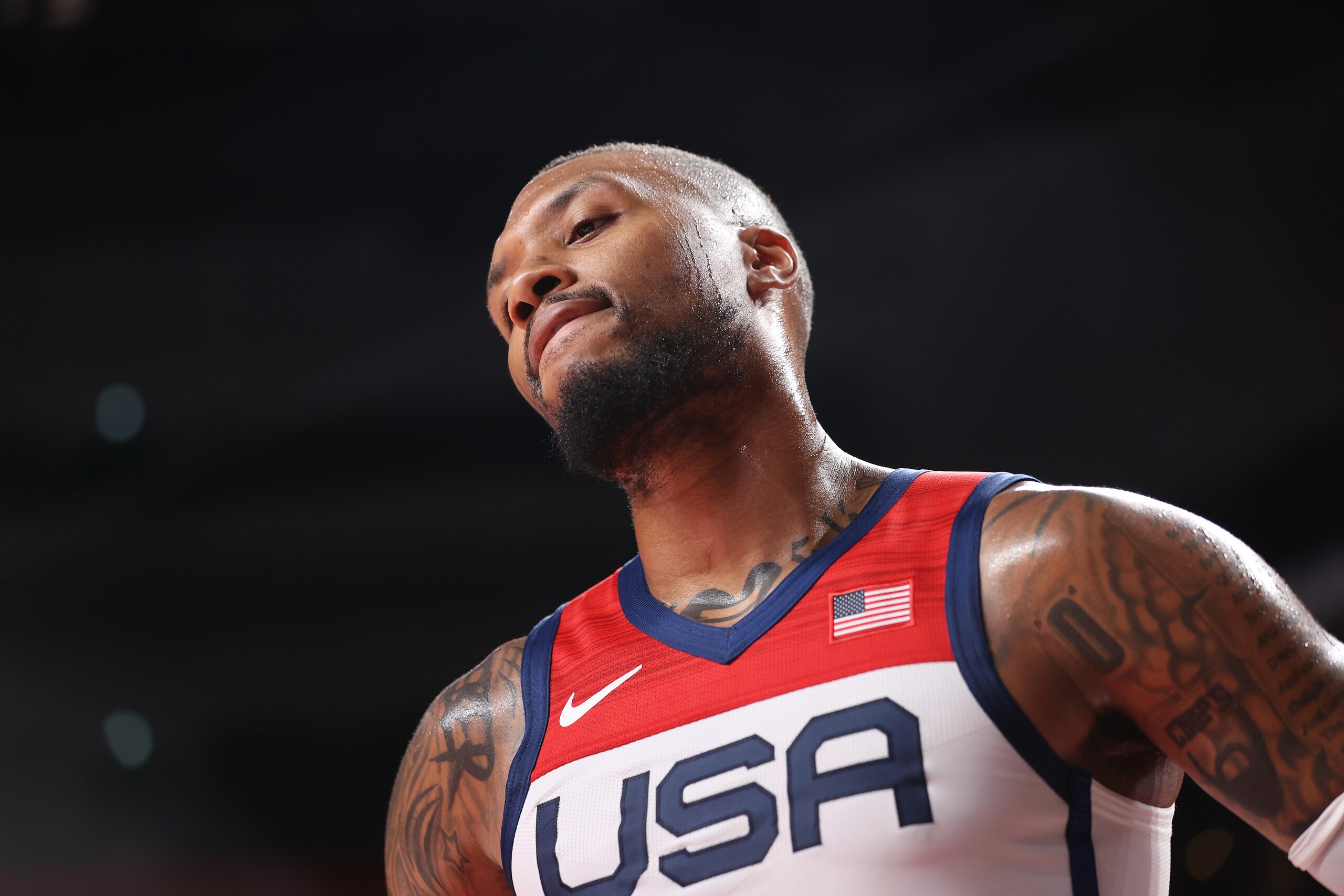 SAITAMA, JAPAN - JULY 28: Damian Lillard #6 of Team United States looks on against Islamic Republic of Iran during the first half of a Men's Preliminary Round Group A game on day five of the Tokyo 2020 Olympic Games at Saitama Super Arena on July 28, 2021 in Saitama, Japan. (Photo by Gregory Shamus/Getty Images)