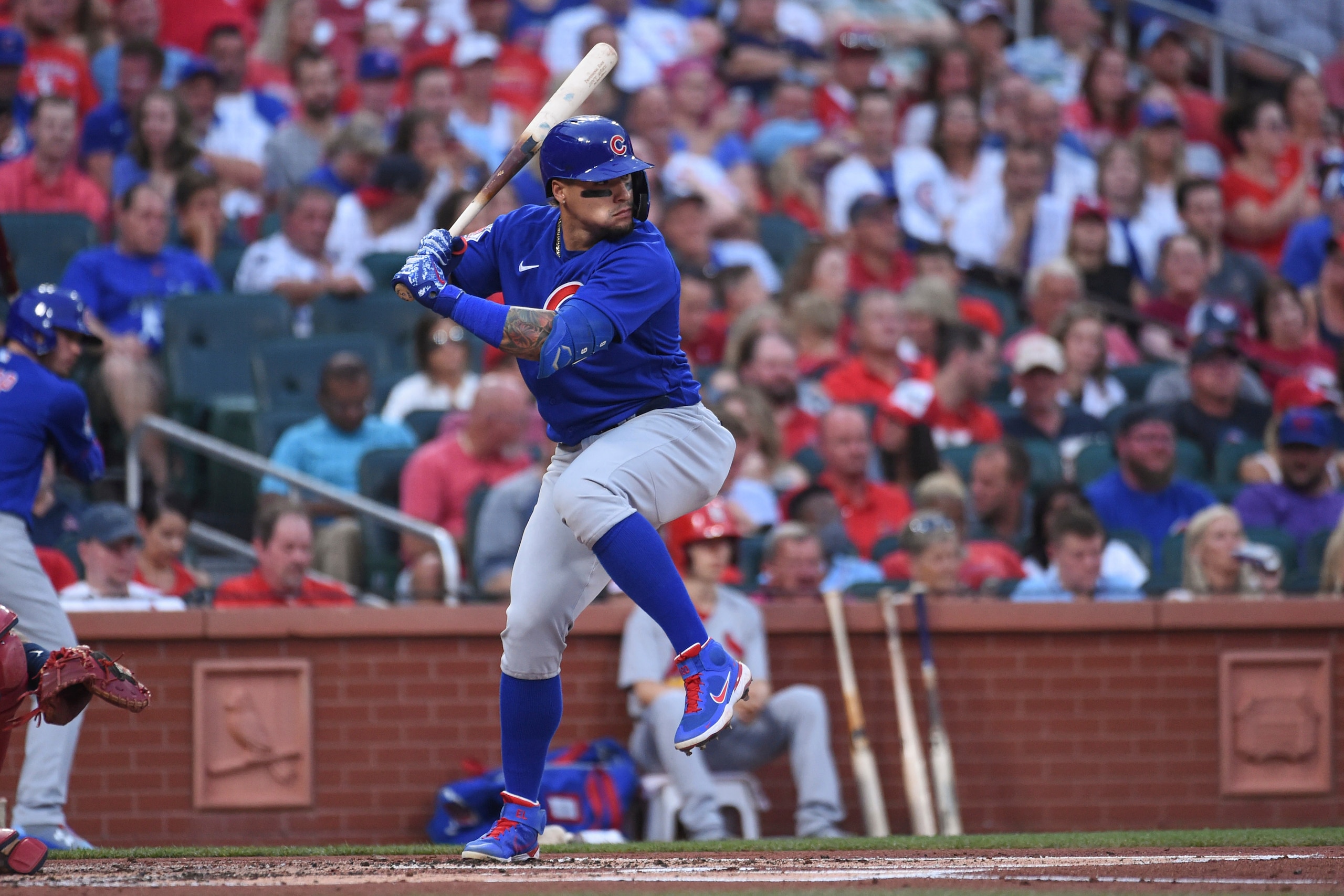 Chicago Cubs' Javier Baez at bat during the first inning of a baseball game against the St. Louis Cardinals on Wednesday, July 21, 2021, in St. Louis. (AP Photo/Joe Puetz)